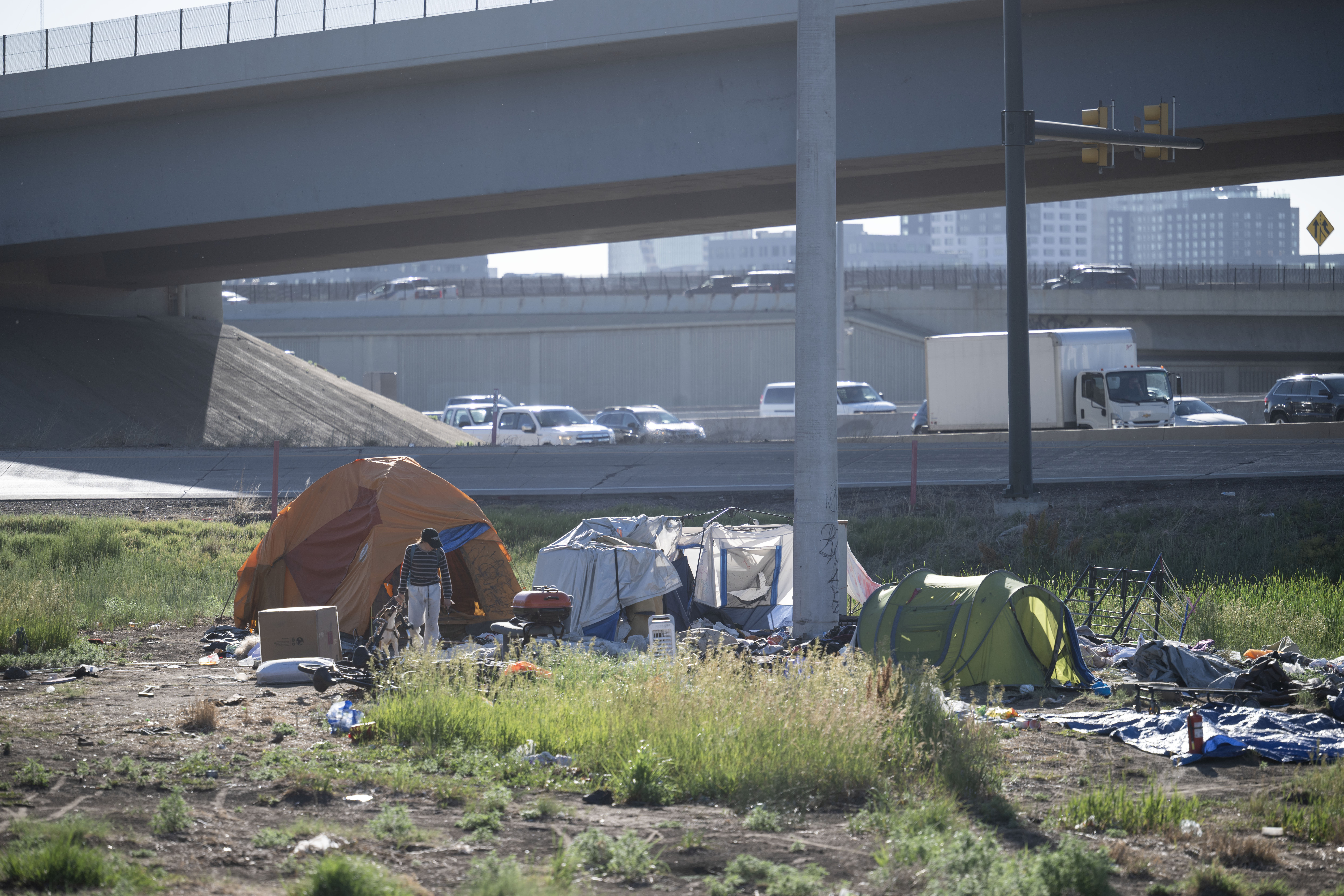 Hannah Haight, left, and Daniel Teitsort rush to clear their encampment before a police sweep destroyed whatever was left near 38th and Fox in Denver on Thursday, June 13, 2024. (StephenSwoffordPhotographerstephen.swofford@gazette.comhttps://secure.gravatar.com/avatar/1ddcaf11c5d70eaa58546ddc4e038687?d=mm&r=g)