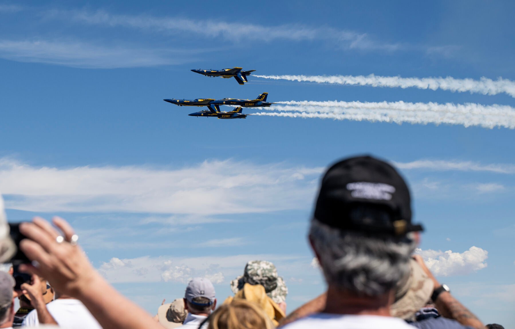 Spectators watch as the Blue Angels perform at the Pikes Peak Regional Airshow at the Colorado Springs Airport on Saturday, Aug. 17, 2024. (Parker Seibold, The Gazette) (Parker Seibold, The Gazette)