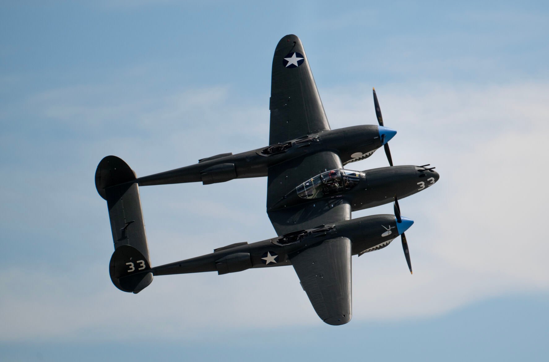 A Lockheed P-38F-5-LO Lightning flies the Pikes Peak Regional Airshow at the Colorado Springs Airport on Saturday, Aug. 17, 2024. (Parker Seibold, The Gazette) (Parker Seibold, The Gazette)