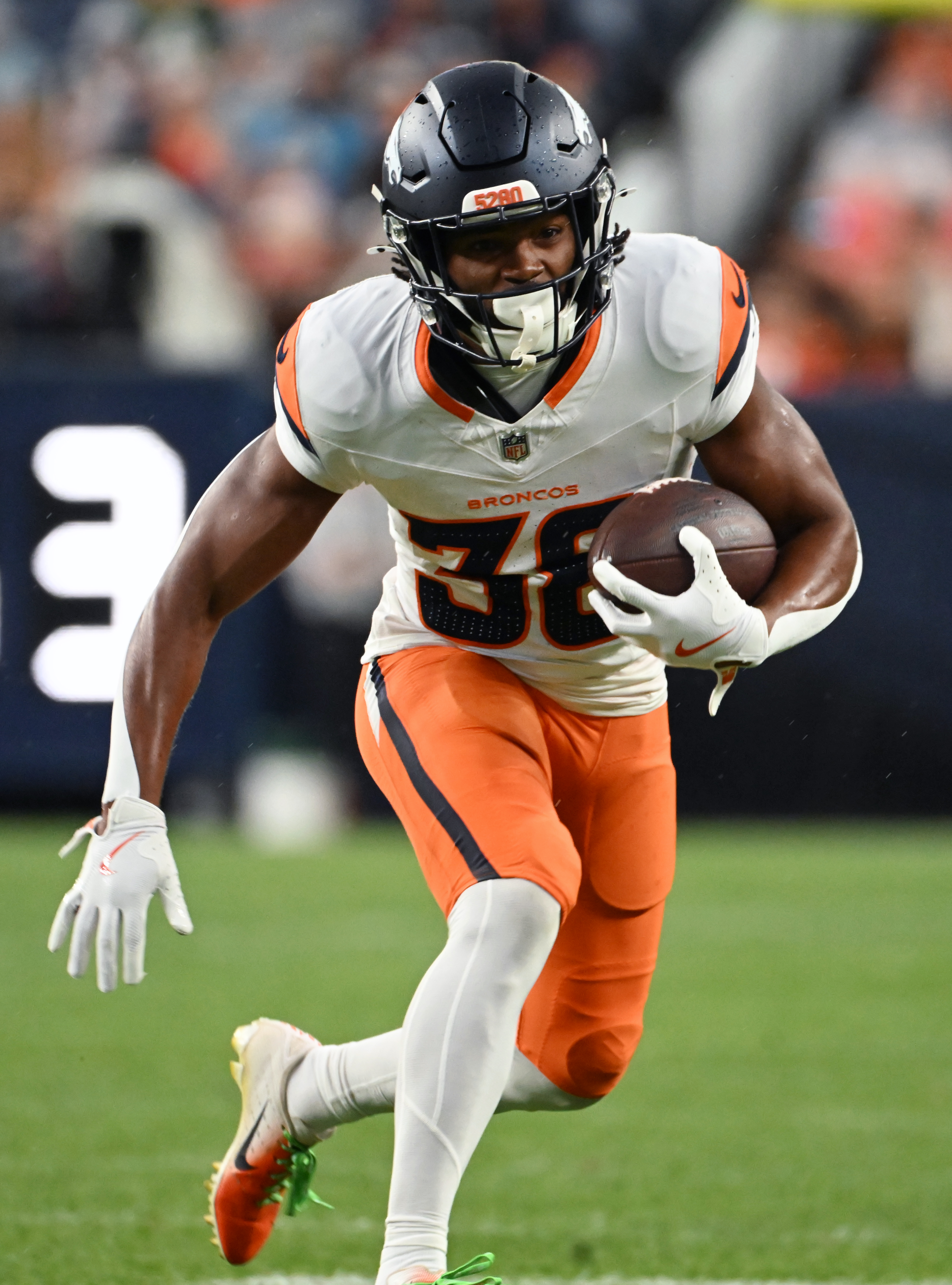 Denver Broncos running back Jaleel McLaughlin (38) carries the ball during a preseason game against the Packers on Sunday, Aug. 18, 2024. The Broncos won the game 27-2. (Jerilee Bennett, The Gazette)