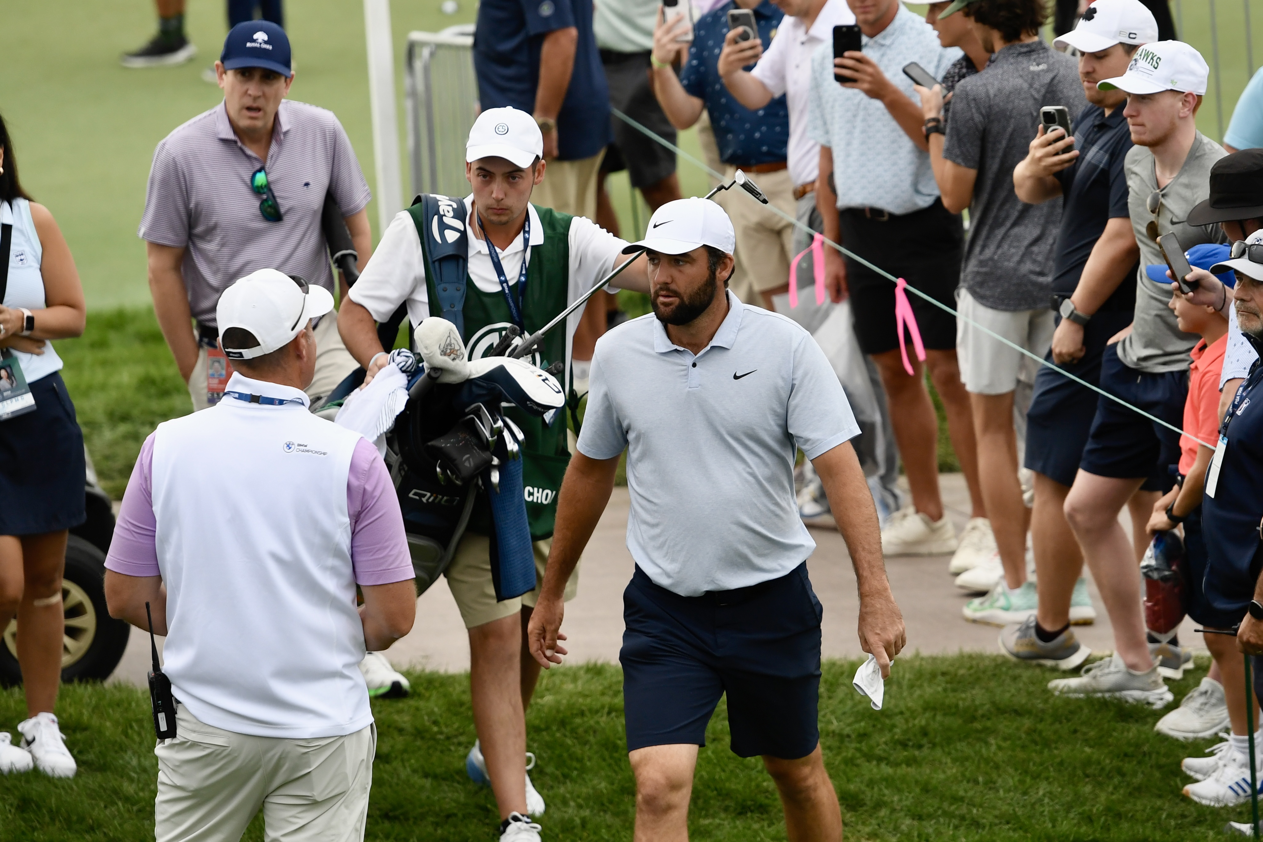 Scottie Scheffler walks to the first tee at Castle Pines Golf Club at Wednesday's BMW Championship pro-am on Aug. 21, 2024. (CarsonFieldcarson.field@gazette.comhttps://secure.gravatar.com/avatar/c524ef3d384945349bed78d70eb2d2cd?d=mm&r=g)