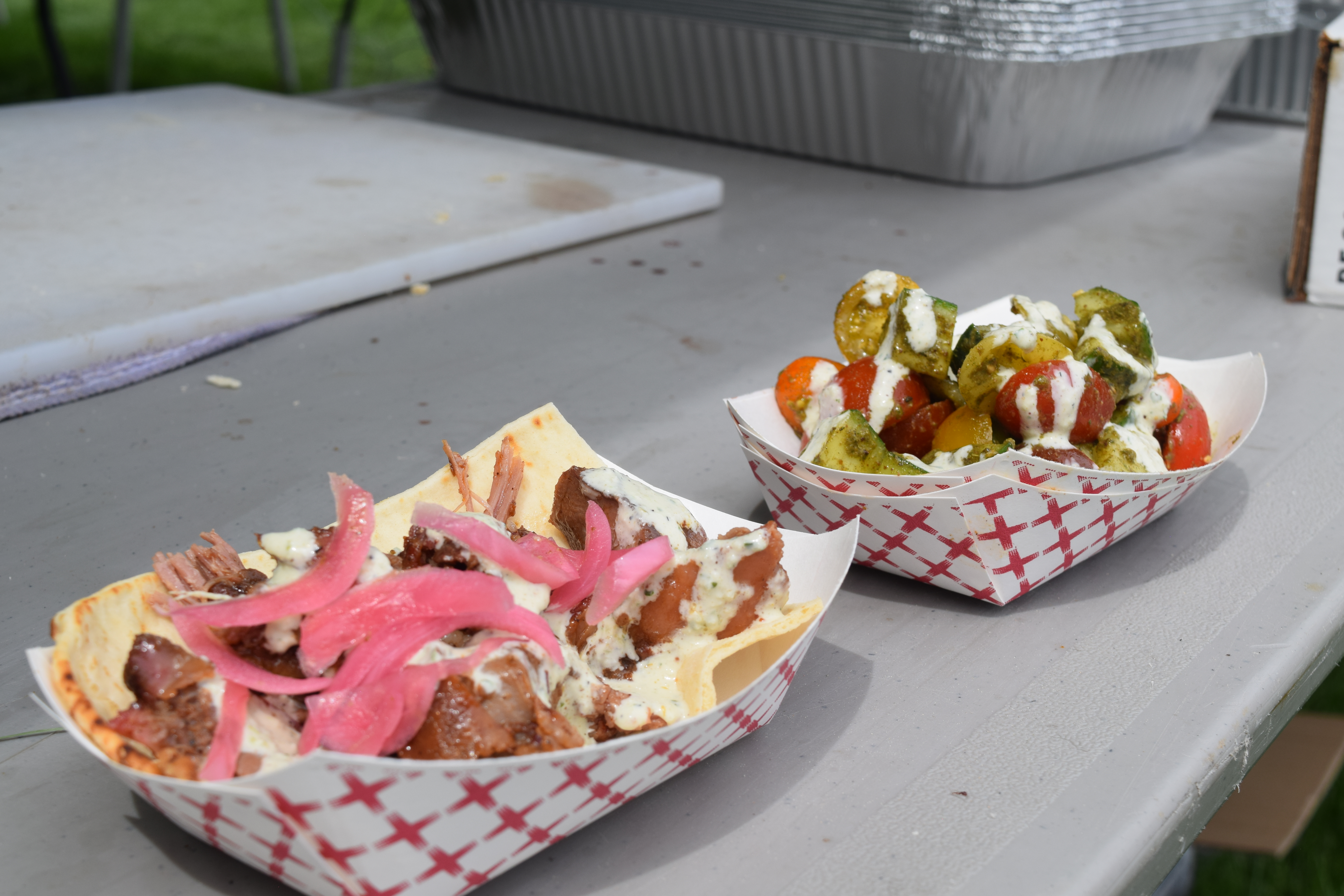 Smoked lamb with toum and heirloom tomatoes, cucumbers and za'atri made by Smok Barbecue at the Q BBQ Festival on Saturday, just one of the 12 different barbecue vendors present at the two-day event. (SageKelleyJefferson County Reportersage.kelley@denvergazette.comhttps://denvergazette.com/content/tncms/avatars/e/5f/457/e5f45740-2717-11ee-85b2-ab80f2d36252.5b966c1d2ce4987987665d57c237eda4.png)