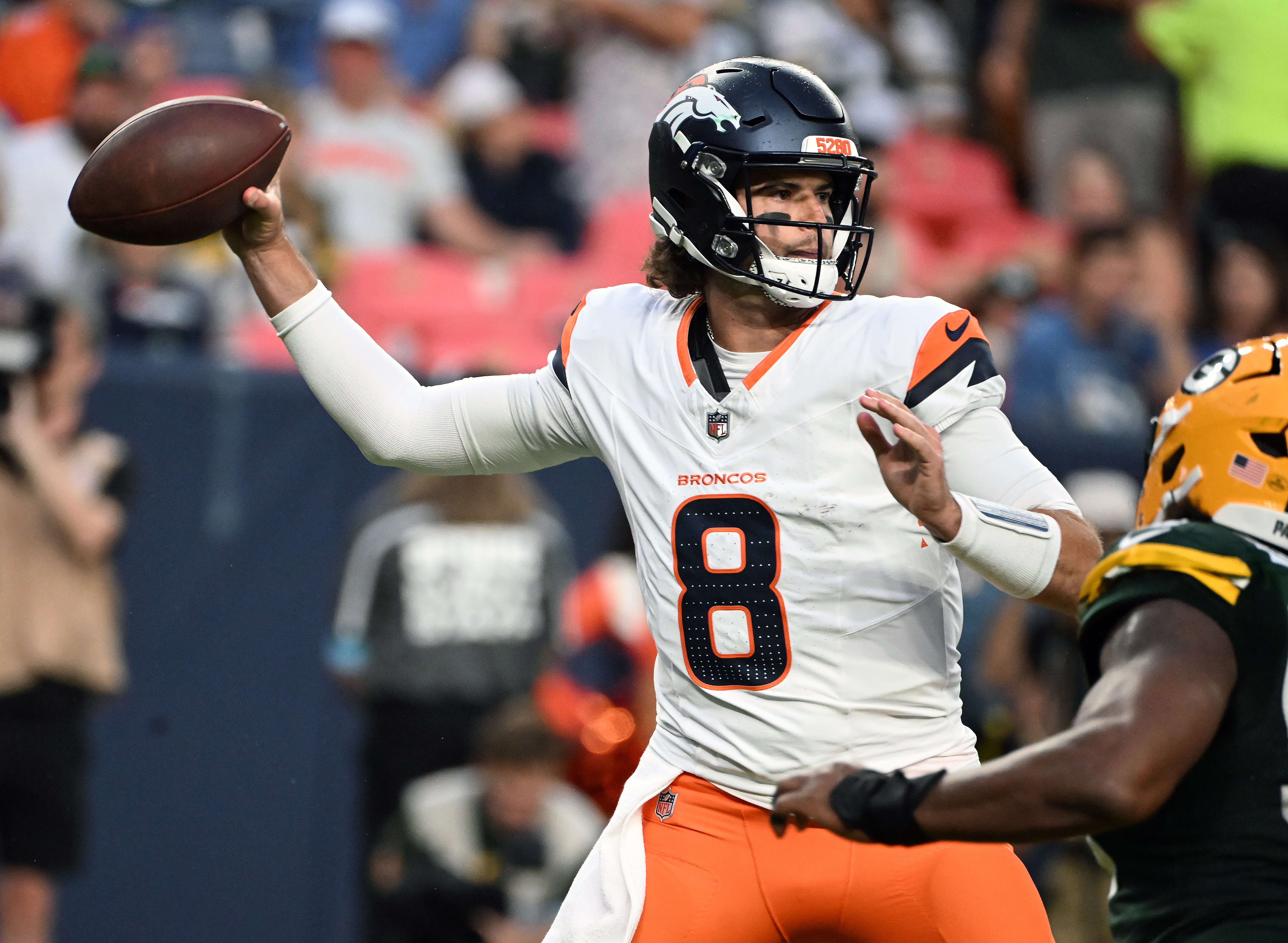 Broncos quarterback Jarrett Stidham throws the ball during the second quarter of a preseason game against the Packers on Sunday, Aug. 18, 2024. (Jerilee Bennett The Gazette)