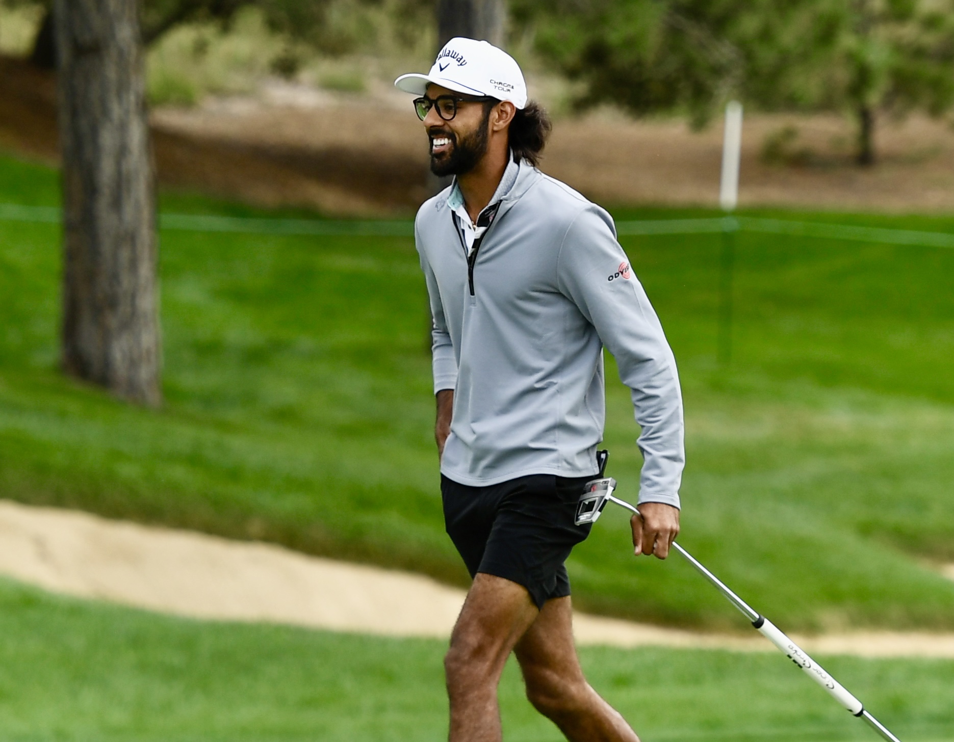 Akshay Bathia walks onto the first green at Castle Pines Golf Club at Wednesday's BMW Championship pro-am on Aug. 21, 2024. (CarsonFieldcarson.field@gazette.comhttps://secure.gravatar.com/avatar/c524ef3d384945349bed78d70eb2d2cd?d=mm&r=g)