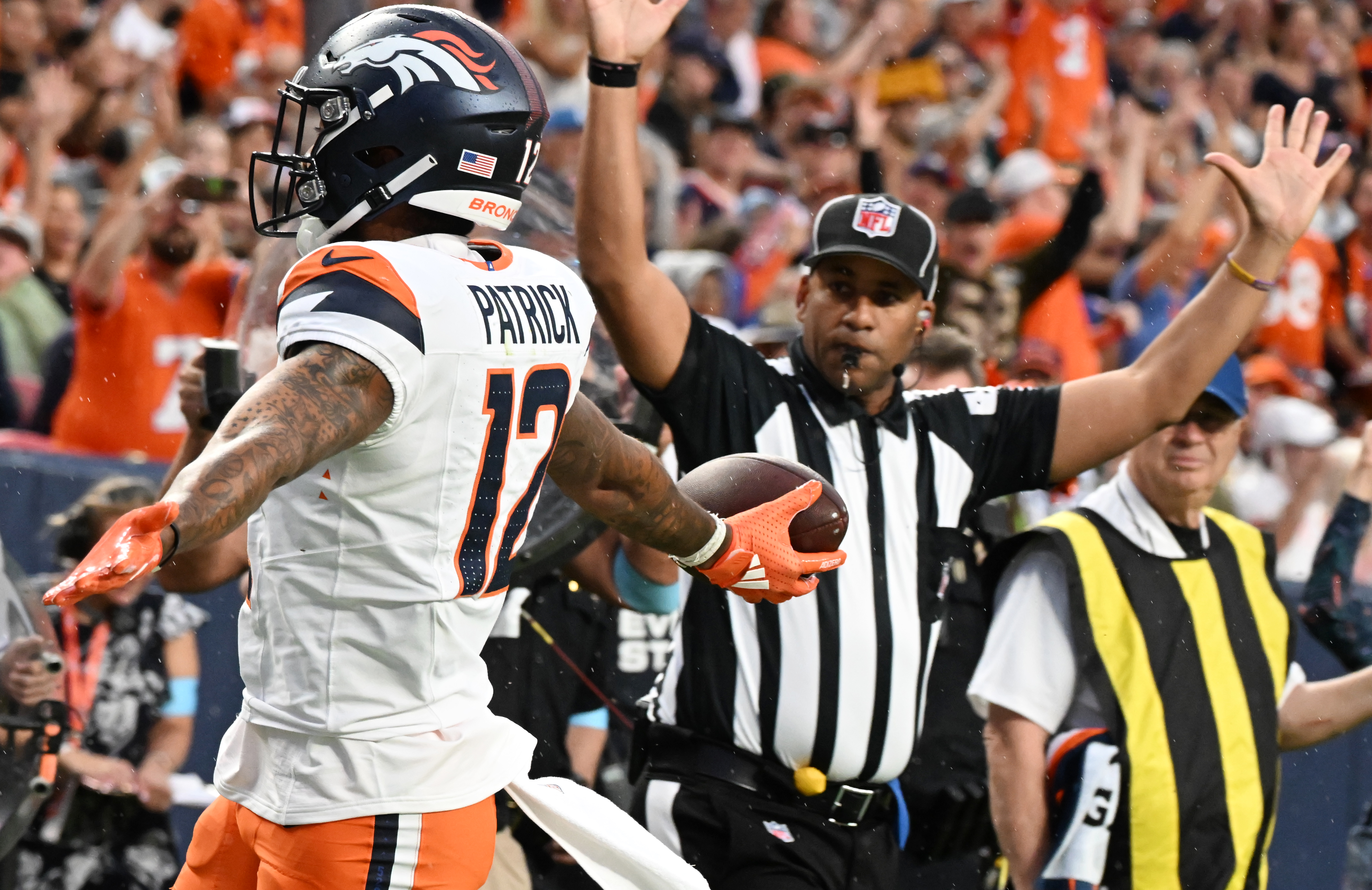 Broncos wide receiver Tim Patrick celebrates a touchdown during the second quarter of a preseason game against the Packers on Sunday, Aug. 18, 2024. (Jerilee Bennett The Gazette)
