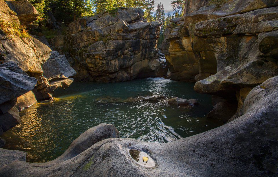 A sole aspen leaf lies in a puddle on the rocks surrounding the Grottos on the Roaring Fork River near Aspen, Colo. Tuesday, Sept. 19, 2017. (The Gazette, Christian Murdock) (CHRISTIAN MURDOCK, THE GAZETTE)