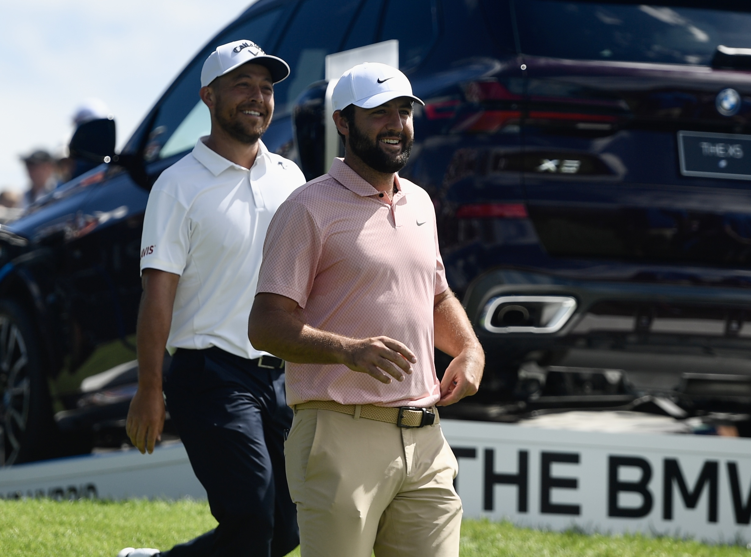 Scottie Scheffler and Xander Schauffele smile while walking off the first tee at Castle Pines Golf Club during the second round of the BMW Championship on Friday, Aug. 23, 2024. (CarsonFieldcarson.field@gazette.comhttps://secure.gravatar.com/avatar/c524ef3d384945349bed78d70eb2d2cd?d=mm&r=g)