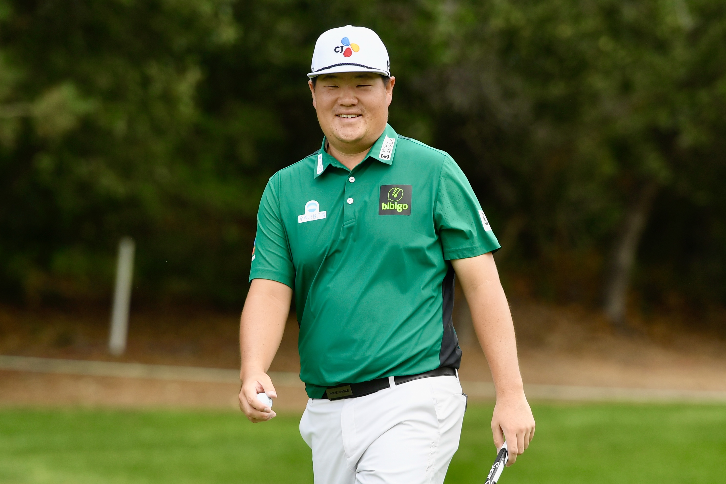 Sungjae Im smiles at Castle Pines Golf Club at Wednesday's BMW Championship pro-am on Aug. 21, 2024. (CarsonFieldcarson.field@gazette.comhttps://secure.gravatar.com/avatar/c524ef3d384945349bed78d70eb2d2cd?d=mm&r=g)