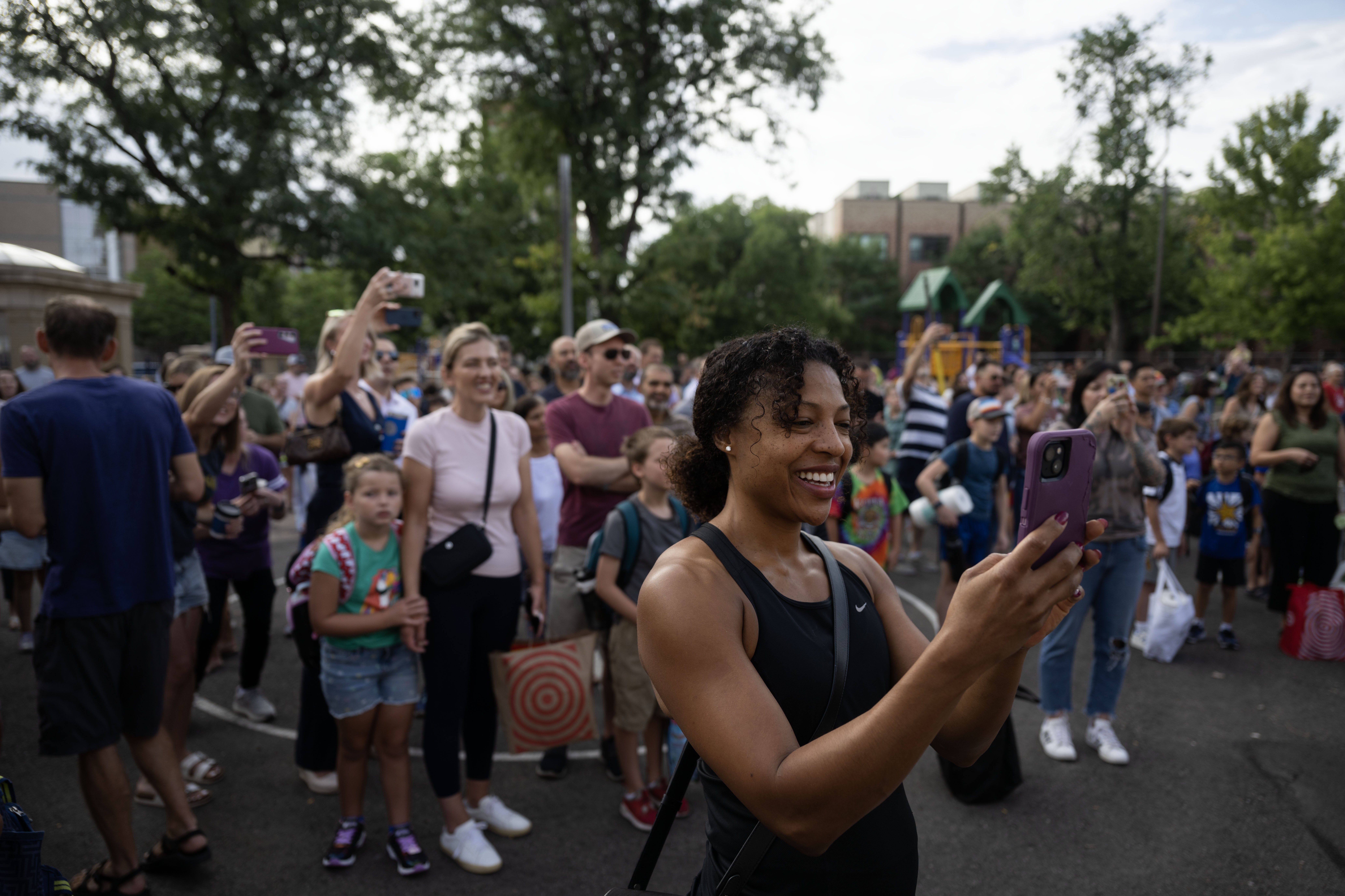 FILE PHOTO: Emily Rohrer, center, takes a photo of her daughter, Emma, 7, before the start of Emma’s first day of 3rd grade at Polaris Elementary School in Denver on Monday, Aug. 19, 2024. (Stephen Swofford, Denver Gazette) (StephenSwoffordPhotographerstephen.swofford@gazette.comhttps://secure.gravatar.com/avatar/1ddcaf11c5d70eaa58546ddc4e038687?d=mm&r=g)