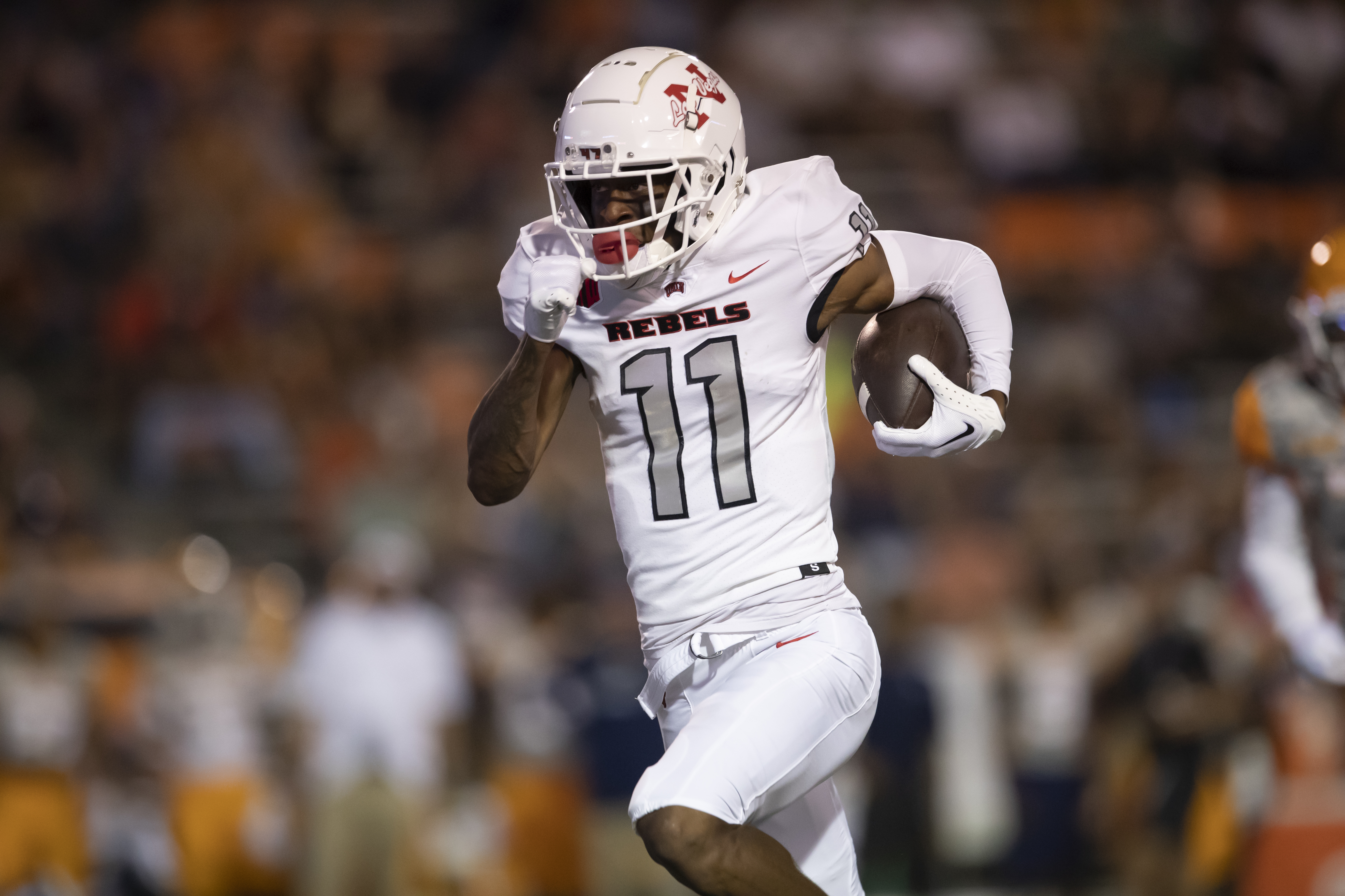 UNLV wide receiver Ricky White (11) runs for yardage during an NCAA college football game against UTEP on Saturday, Sept. 23, 2023, in El Paso, Texas. (AP Photo/Andres Leighton) (Andres Leighton)