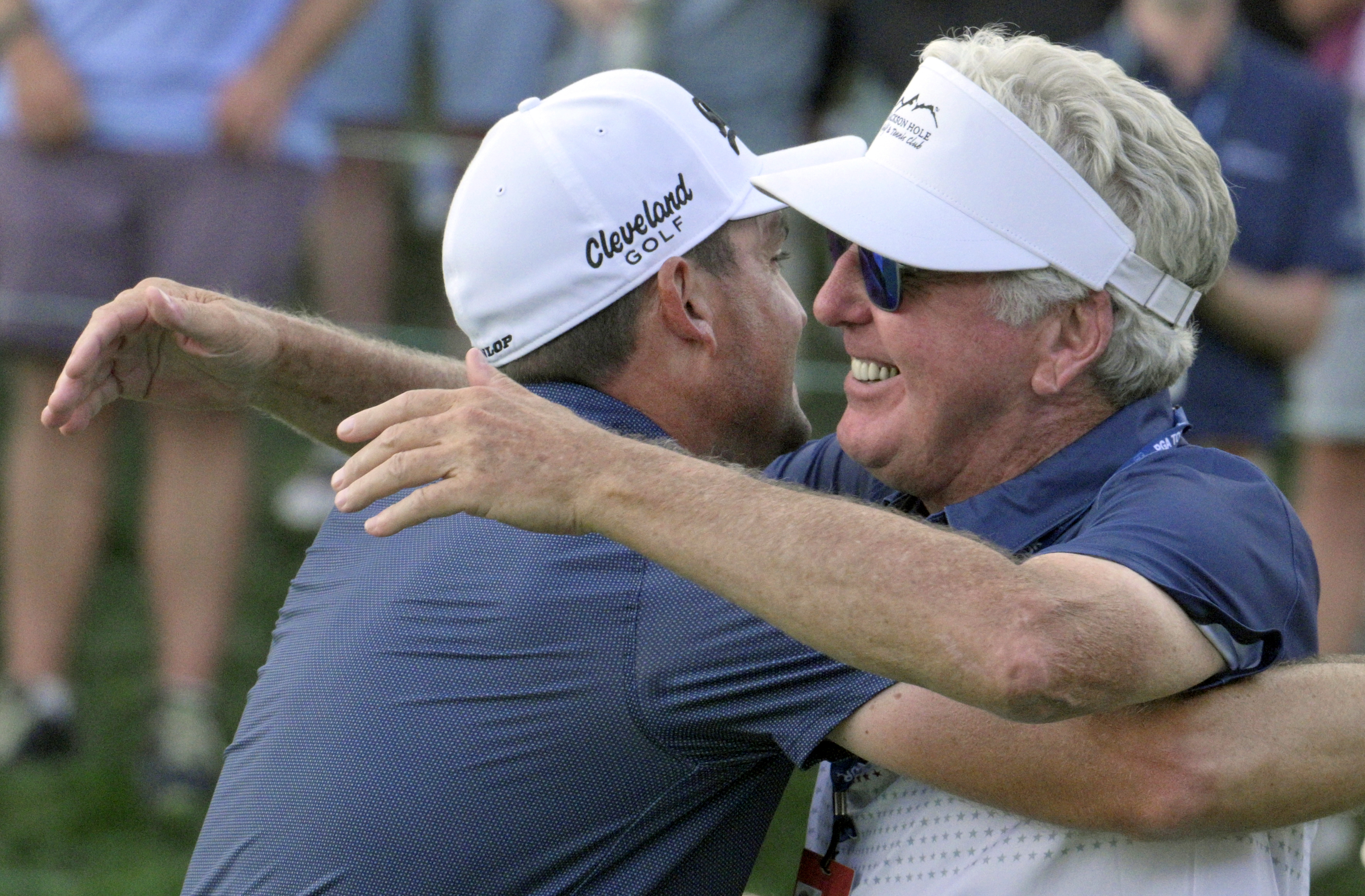 Keegan Bradley hugs his father, Mark Bradley, after winning the 2024 BMW Championship on Sunday, August 25, 2024. Bradley won the competition with a score of 12 under.
