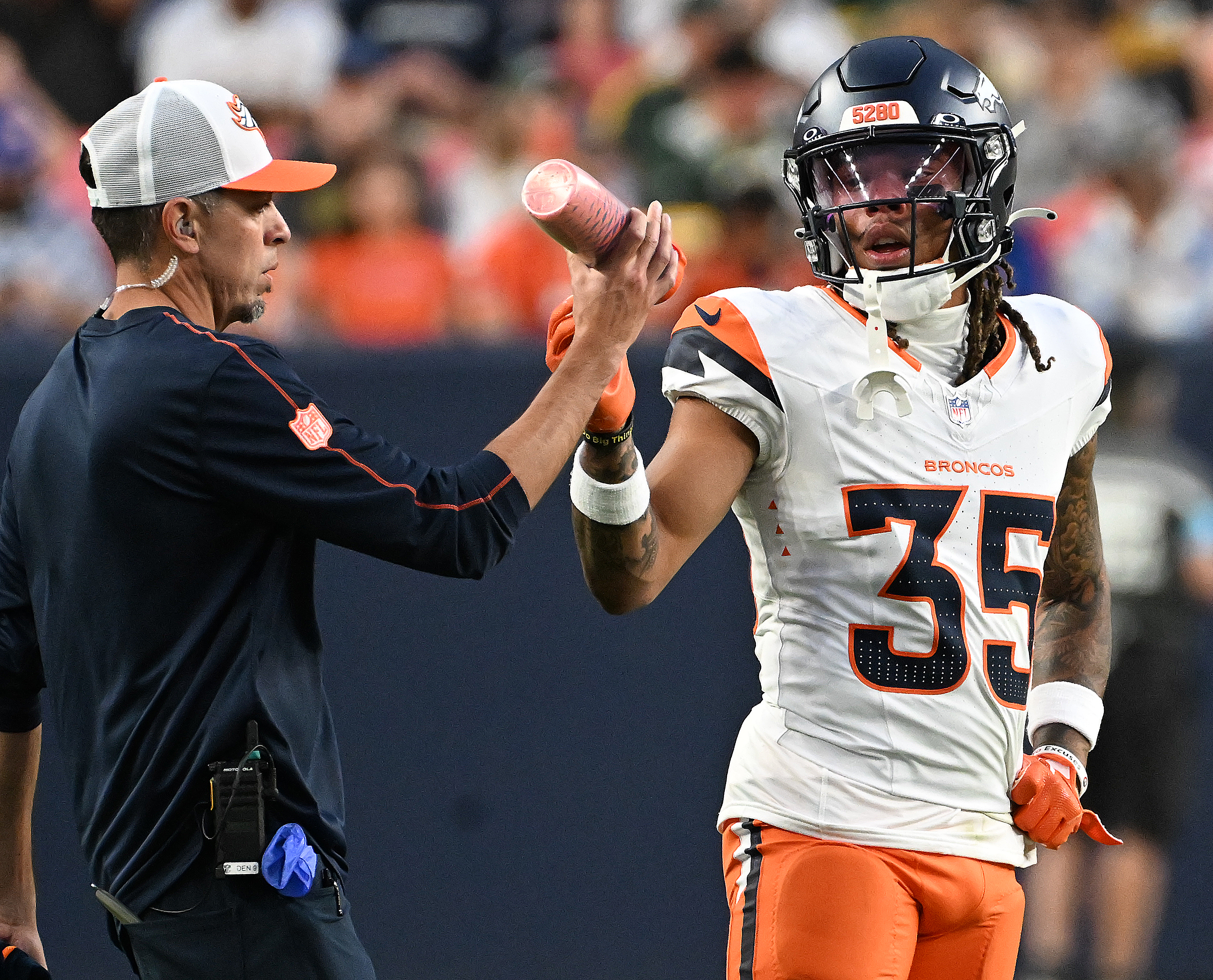 Denver Broncos cornerback Reese Taylor (35) takes a water break during a preseason game against the Packers on Sunday, Aug. 18, 2024. The Broncos won the game 27-2. (Jerilee Bennett, The Gazette)