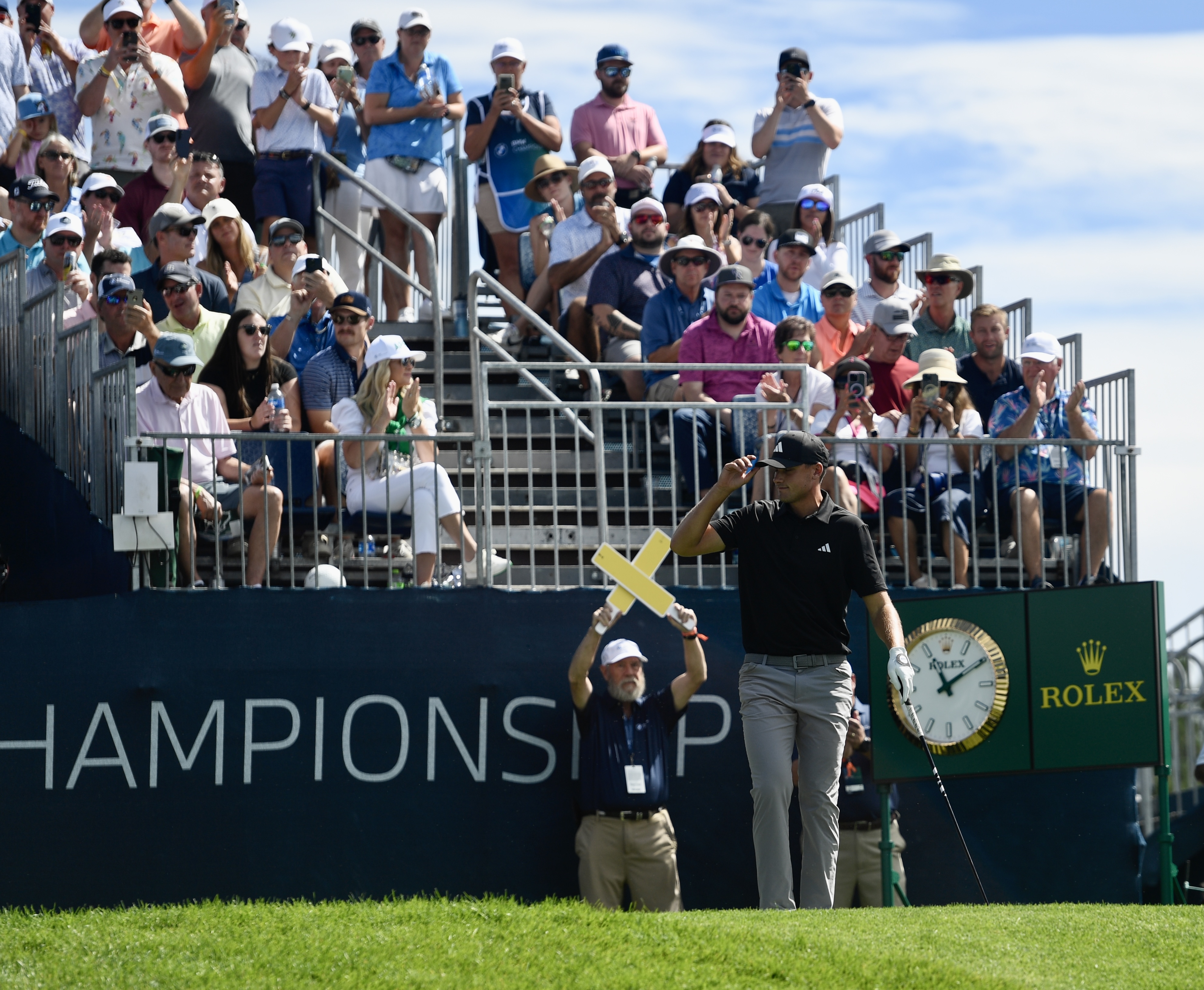Ludvig Aberg salutes the crowd at Castle Pines Golf Club before the second round of the BMW Championship on Friday, Aug. 23, 2024. (CarsonFieldcarson.field@gazette.comhttps://secure.gravatar.com/avatar/c524ef3d384945349bed78d70eb2d2cd?d=mm&r=g)