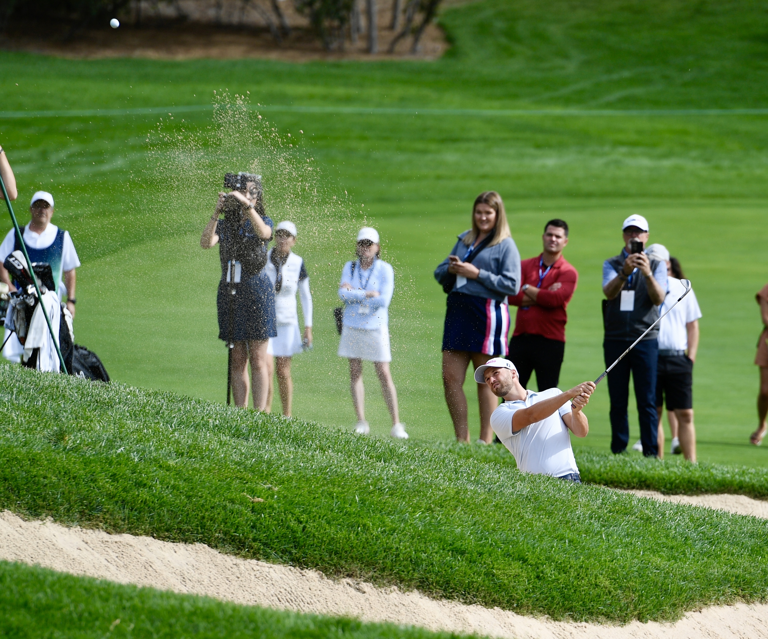 Wyndham Clark hits out of the sand at Castle Pines Golf Club at Wednesday's BMW Championship pro-am on Aug. 21, 2024. (CarsonFieldcarson.field@gazette.comhttps://secure.gravatar.com/avatar/c524ef3d384945349bed78d70eb2d2cd?d=mm&r=g)