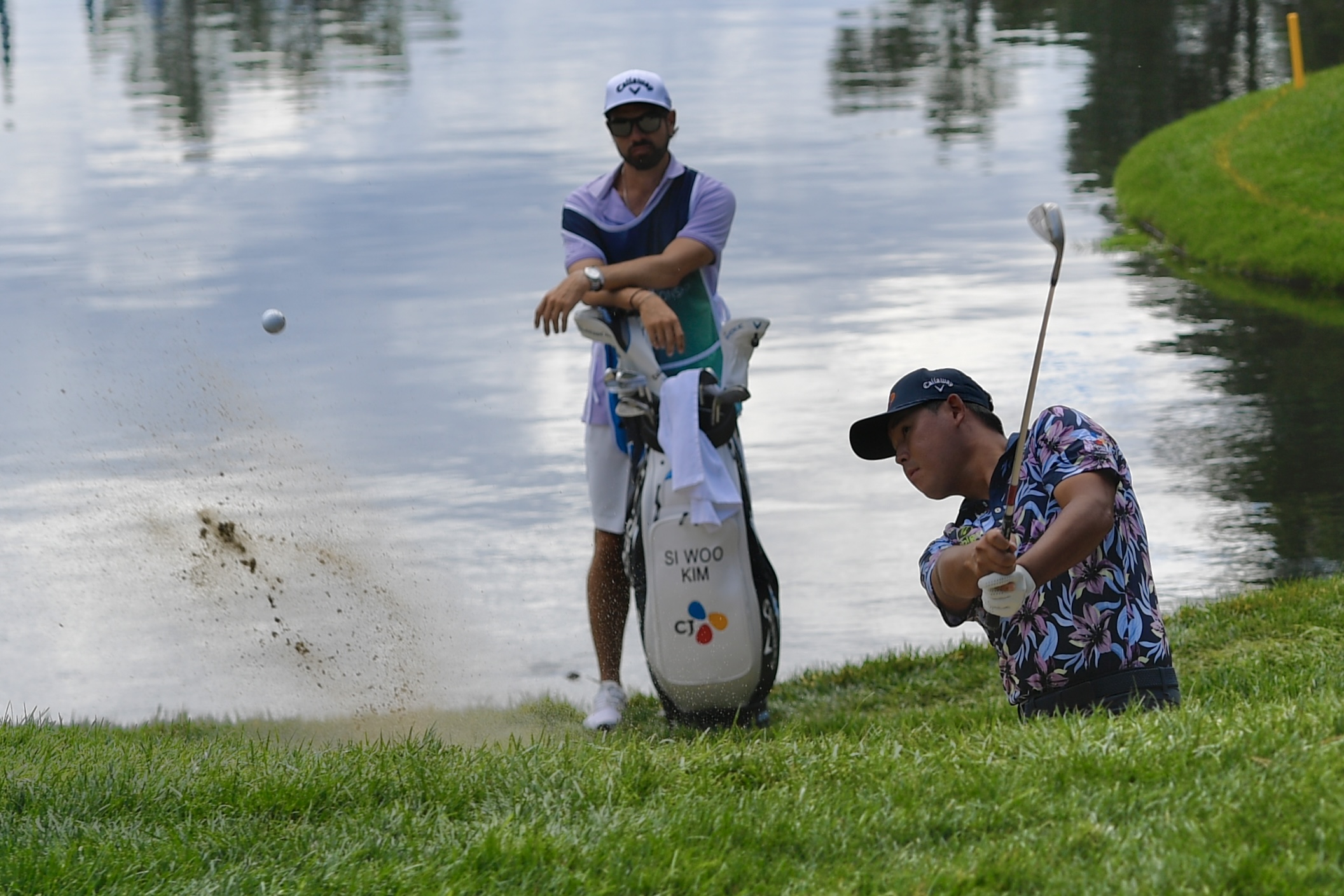 Si Woo Kim hits out of a bunker at Castle Pines Golf Club during the second round of the BMW Championship on Friday, Aug. 23, 2024. (CarsonFieldcarson.field@gazette.comhttps://secure.gravatar.com/avatar/c524ef3d384945349bed78d70eb2d2cd?d=mm&r=g)
