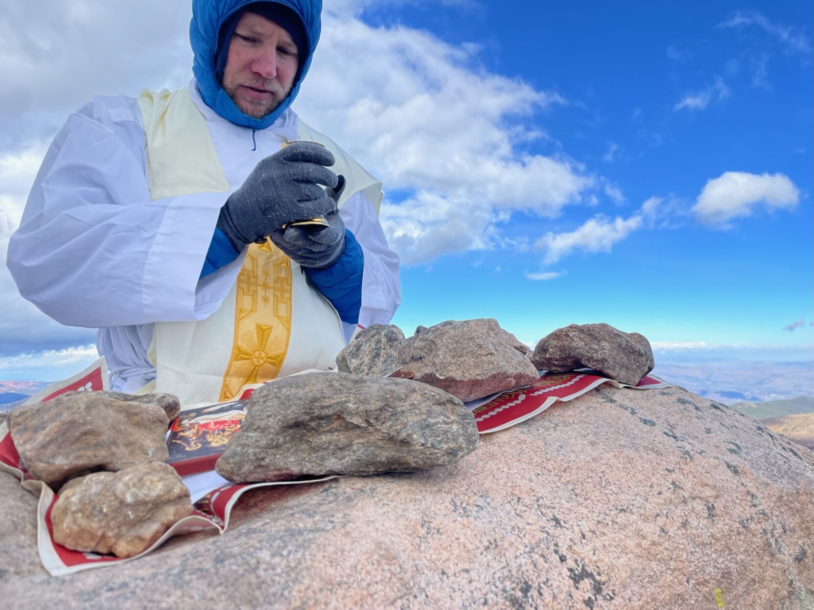 {span}Father John Nepil saying a very cold mass on Mount of the Holy Cross. Courtesy photo{/span}