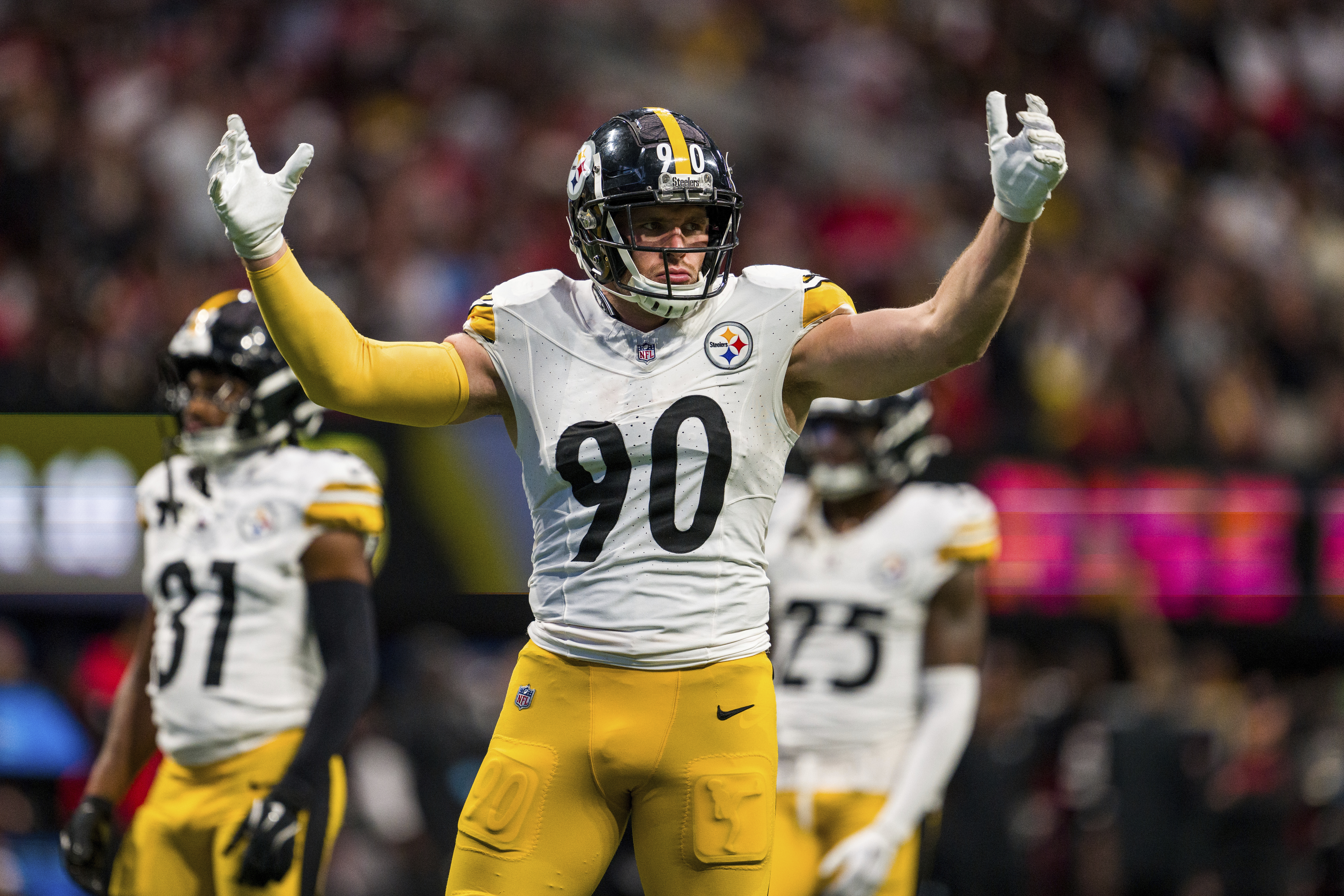Pittsburgh Steelers linebacker T.J. Watt (90) pumps up the crowd during the second half of an NFL football game against the Atlanta Falcons, Sunday, Sept. 8, 2024, in Atlanta. The Steelers defeated the Falcons 18-10. (AP Photo/Danny Karnik) (Danny Karnik)