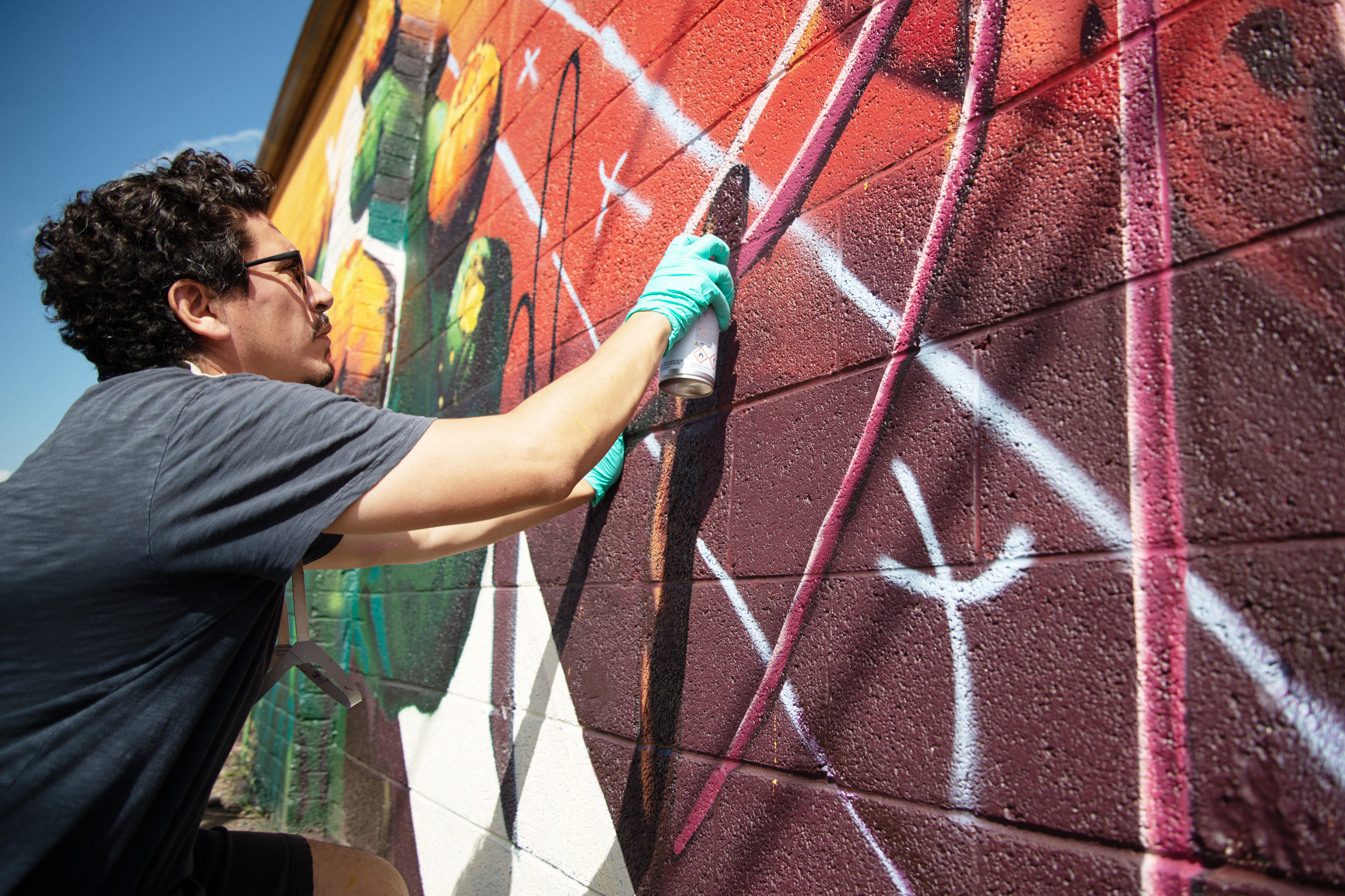 Jay Hernandez works on a mural on the side of the Vintage Theatre as part of the fifth annual Colfax Canvas festival in the Aurora Cultural Arts District on Wednesday, Sept. 11, 2024. (TomHellauerMultimedia Producertom.hellauer@denvergazette.comhttps://denvergazette.com/content/tncms/avatars/f/9e/622/f9e6228a-3b6b-11ed-bf10-fbb71fa8e421.f54b911252c540f1d61709edc4727a39.png)