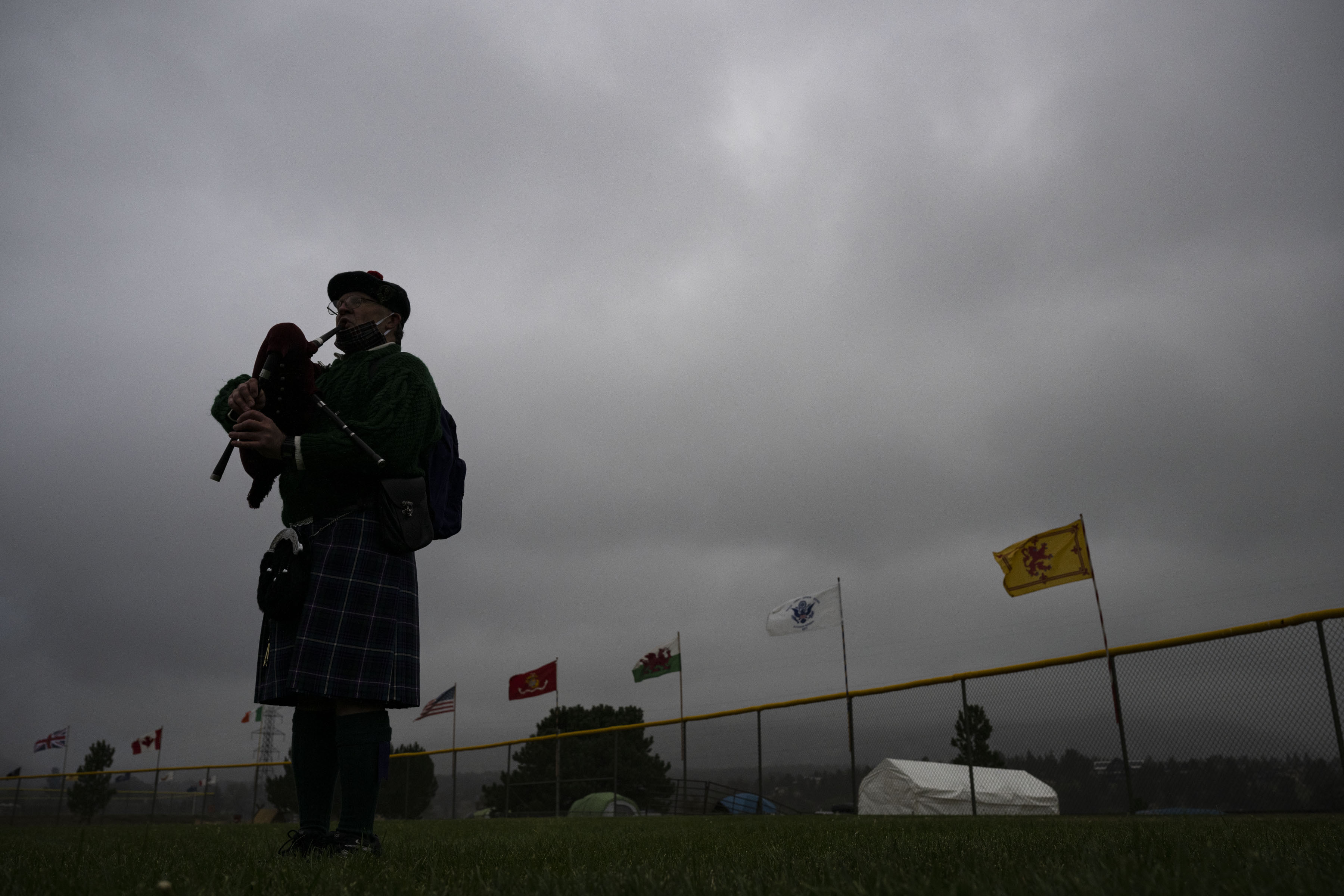 FILE PHOTO: North metro area resident Bob Shepard stands under a stormy sky as he practices playing his Galician gaita, a traditional Spanish bagpipe, after having it looked over by it’s maker during the first day of the Long's Peak Scottish-Irish Highland Festival on Friday, Sept. 9, 2022, in Estes Park, Colo. The 2024 festival is this weekend. (Timothy Hurst)