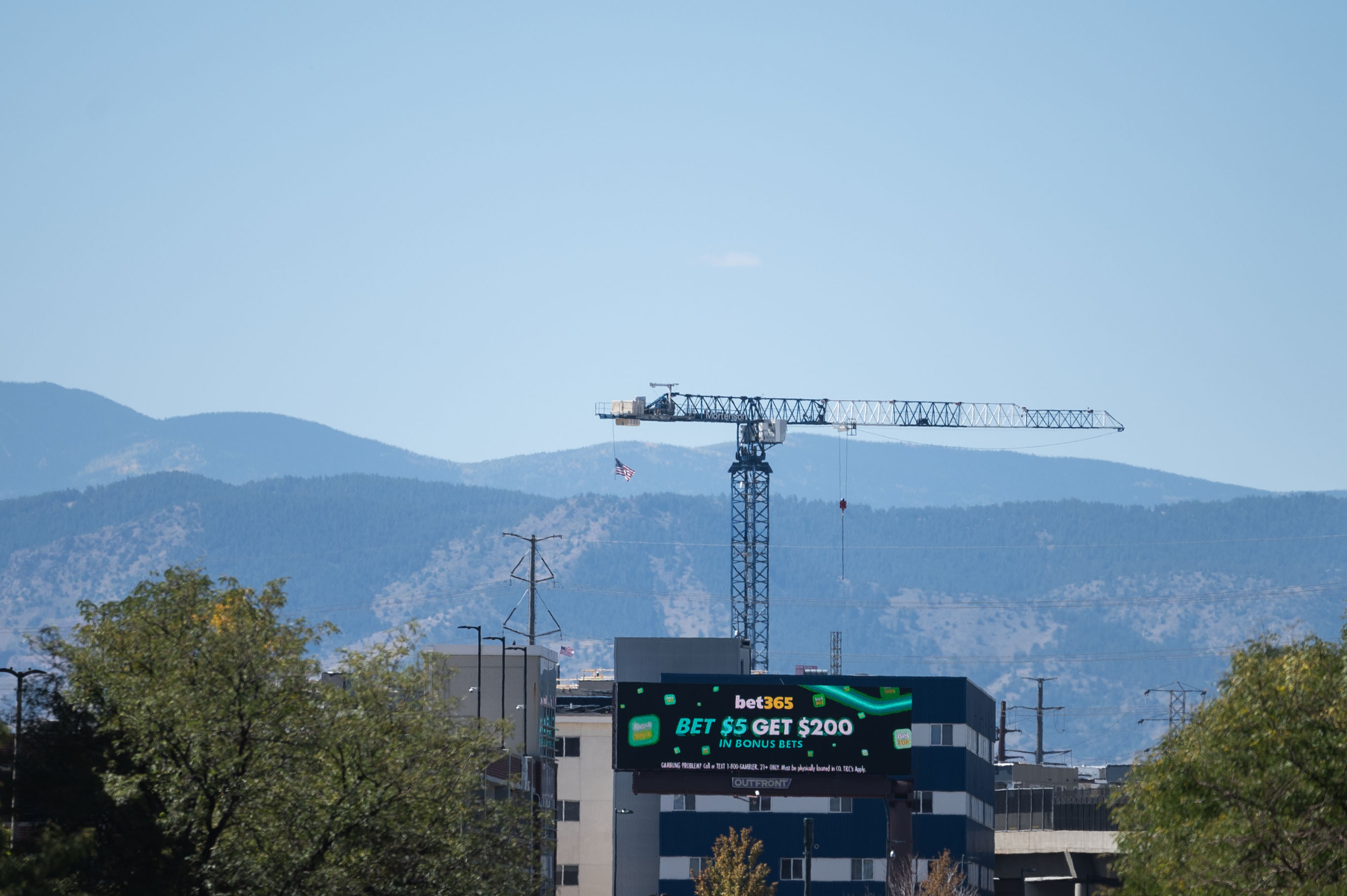 A construction crane works near Ball Arena on Thursday, Sept. 19, 2024. The city plans to exempt the stadium's development from view plane restrictions established to protect mountain views from Old City Hall's bell tower. Some downtown residents worry new towers could hurt their property values if the views are blocked. (Stephen Swofford, Denver Gazette) (StephenSwoffordPhotographerstephen.swofford@gazette.comhttps://secure.gravatar.com/avatar/1ddcaf11c5d70eaa58546ddc4e038687?d=mm&r=g)