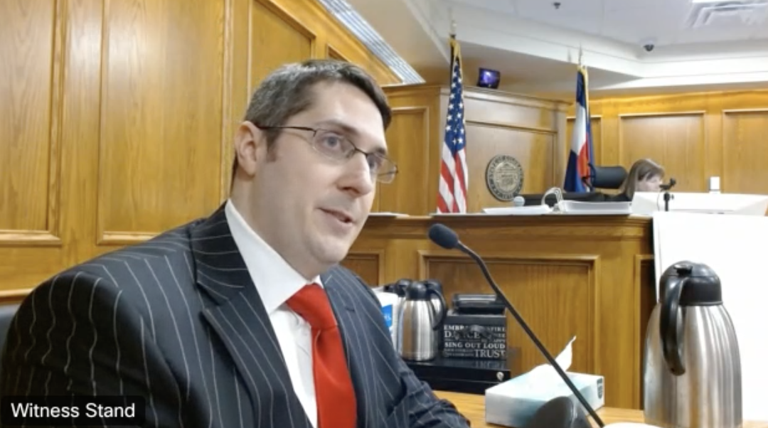 Dr. Ian Lamoureux, a forensic psychiatrist who reviewed the entire case and evaluations for the prosecution, testified in the Ahmad Alissa trial on Wednesday. He said that he believed Alissa was not insane at the time of the mass shooting. (Screengrab of the 20th Judicial District's live feed via WebEx)