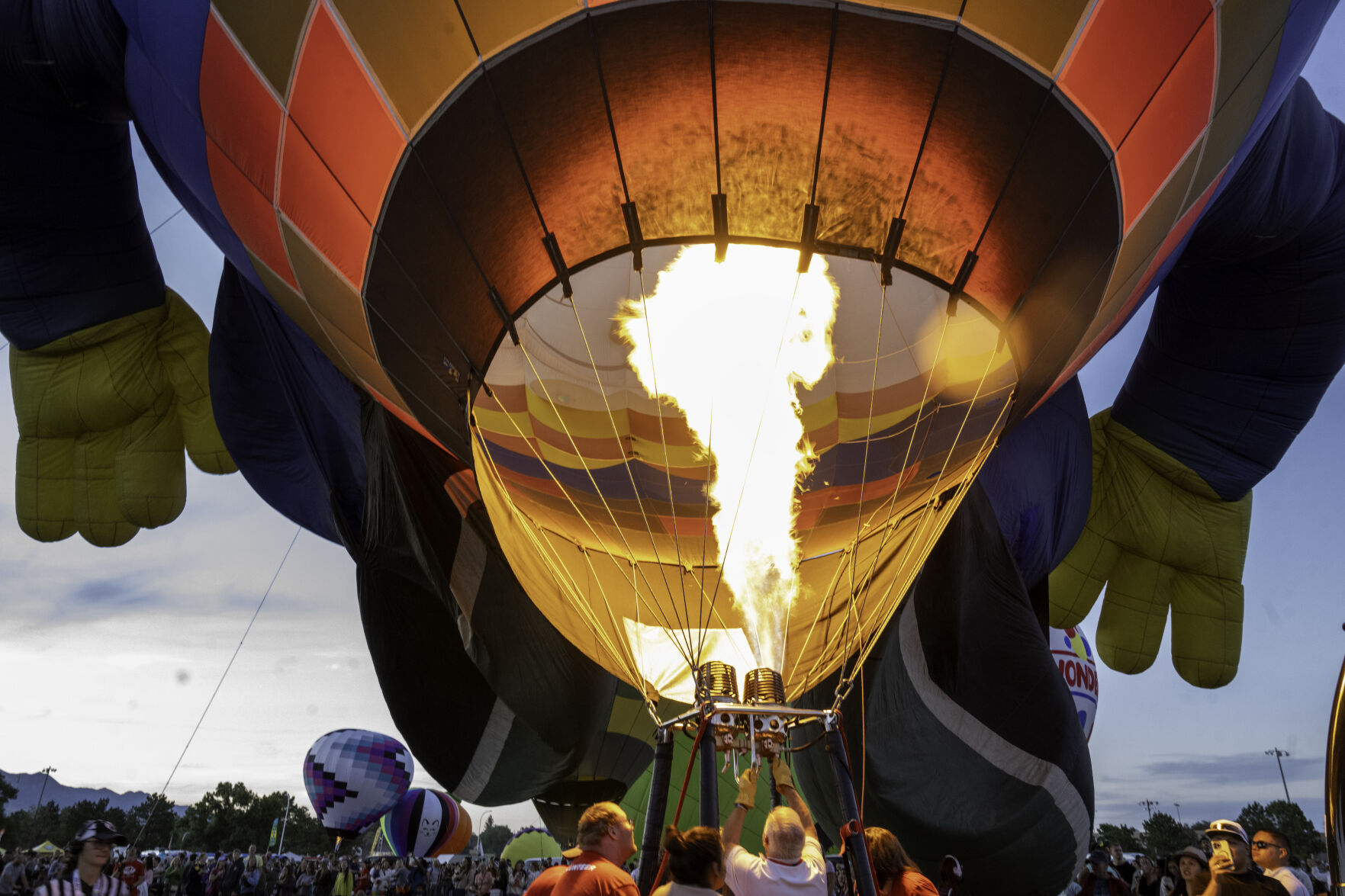 The Humpty Dumpty ball inflates during a balloon glow evening of the Colorado Springs Labor Day Lift Off on Sunday, Sept. 1, 2024.
