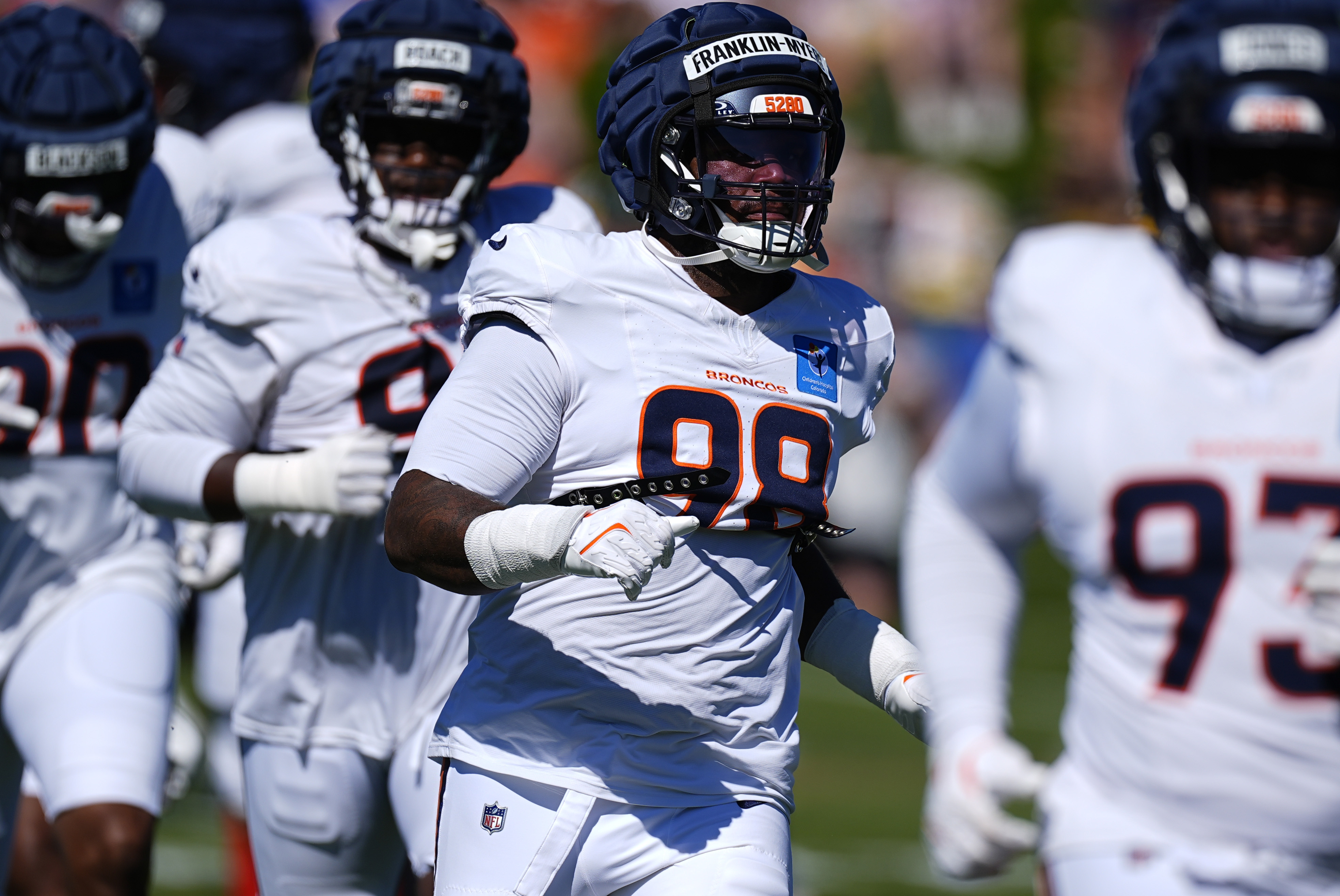 Denver Broncos defensive end John Franklin-Myers (98) takes part in drills during a joint NFL training camp practice at the Broncos' headquarters Friday, Aug. 16, 2024, in Centennial, Colo. (AP Photo/David Zalubowski) (David Zalubowski)