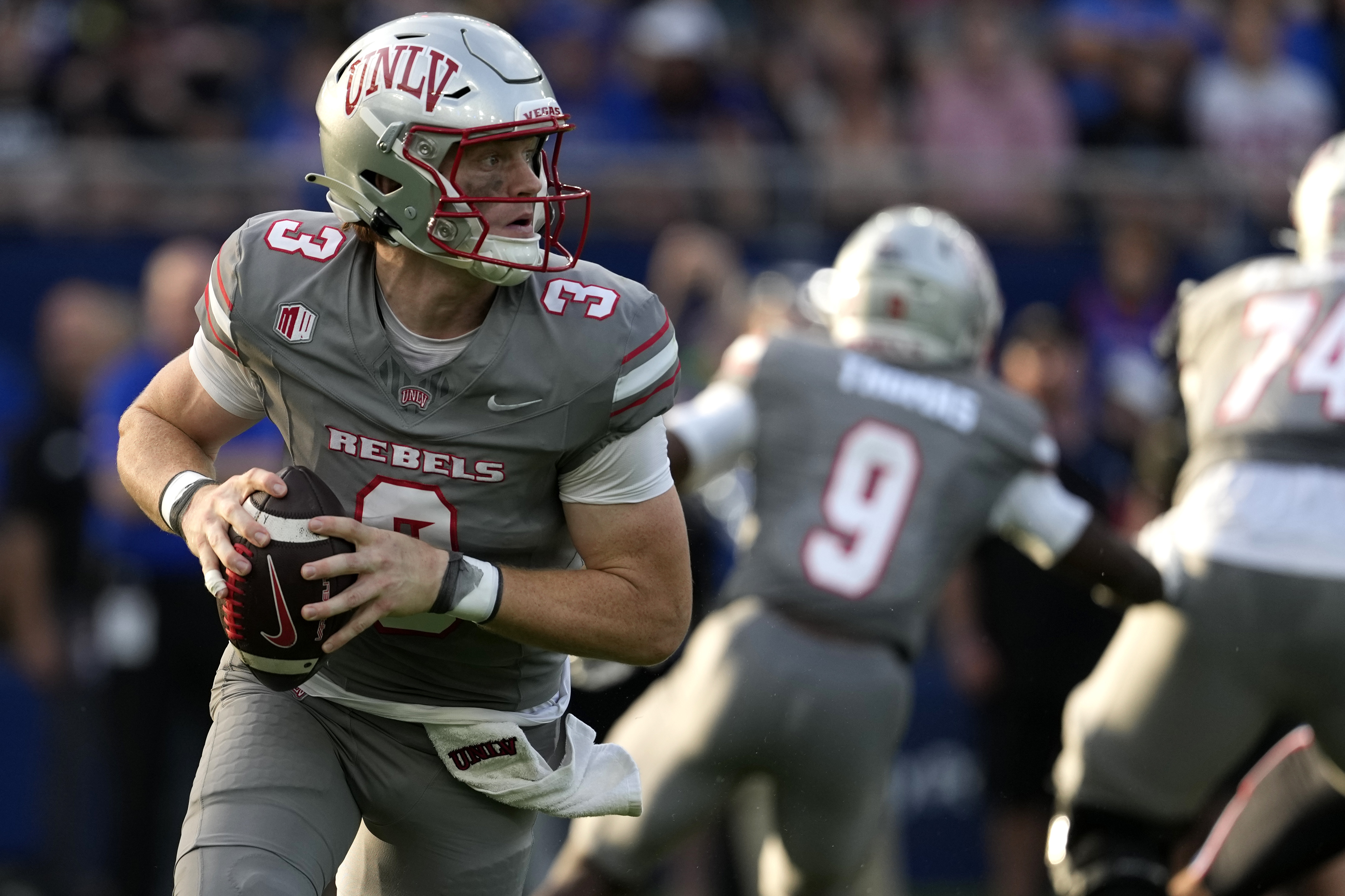 UNLV quarterback Matthew Sluka (3) looks to pass against Kansas in the first half of an NCAA college football game Friday, Sept. 13, 2024, at Children's Mercy Park in Kansas City, Kan. (AP Photo/Ed Zurga) (Ed Zurga)