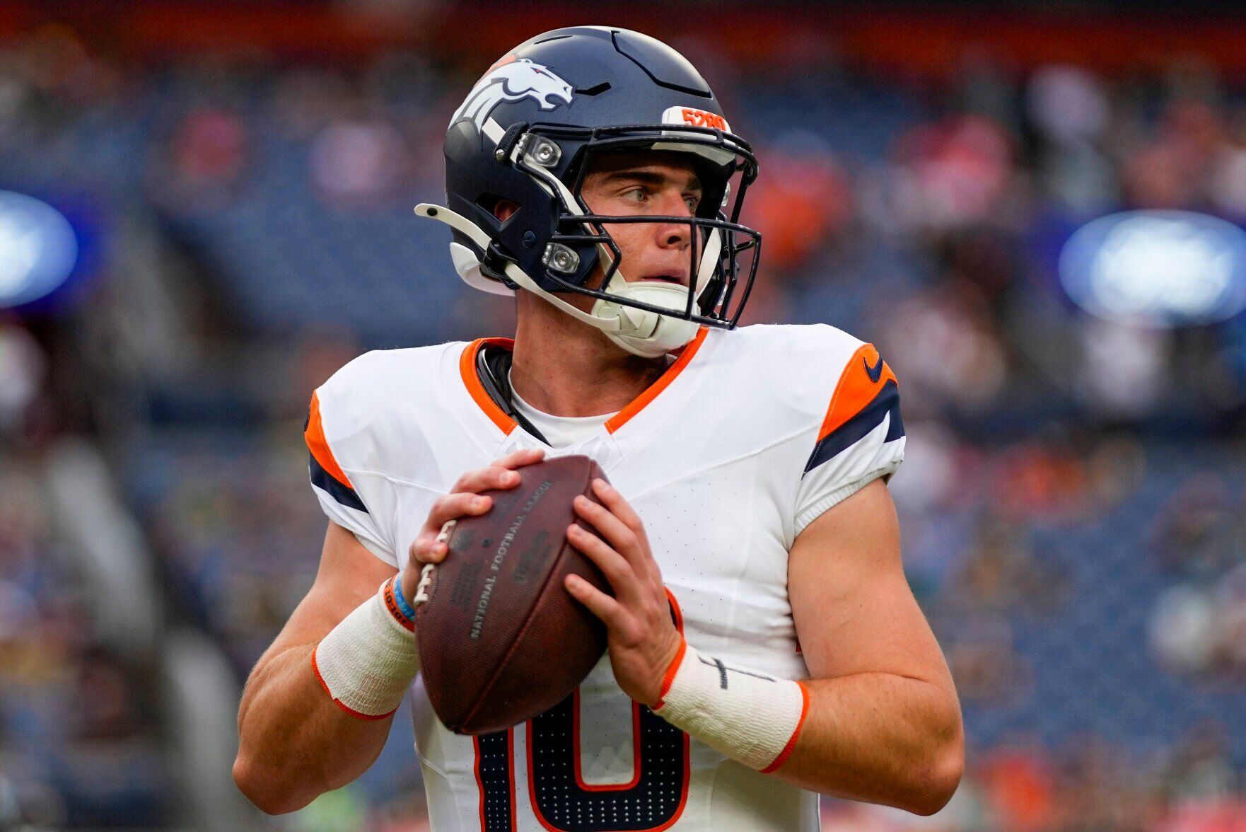 Broncos quarterback Bo Nix warms up against the Packers during an Aug. 18 preseason game in Denver. (THE ASSOCIATED PRESS)