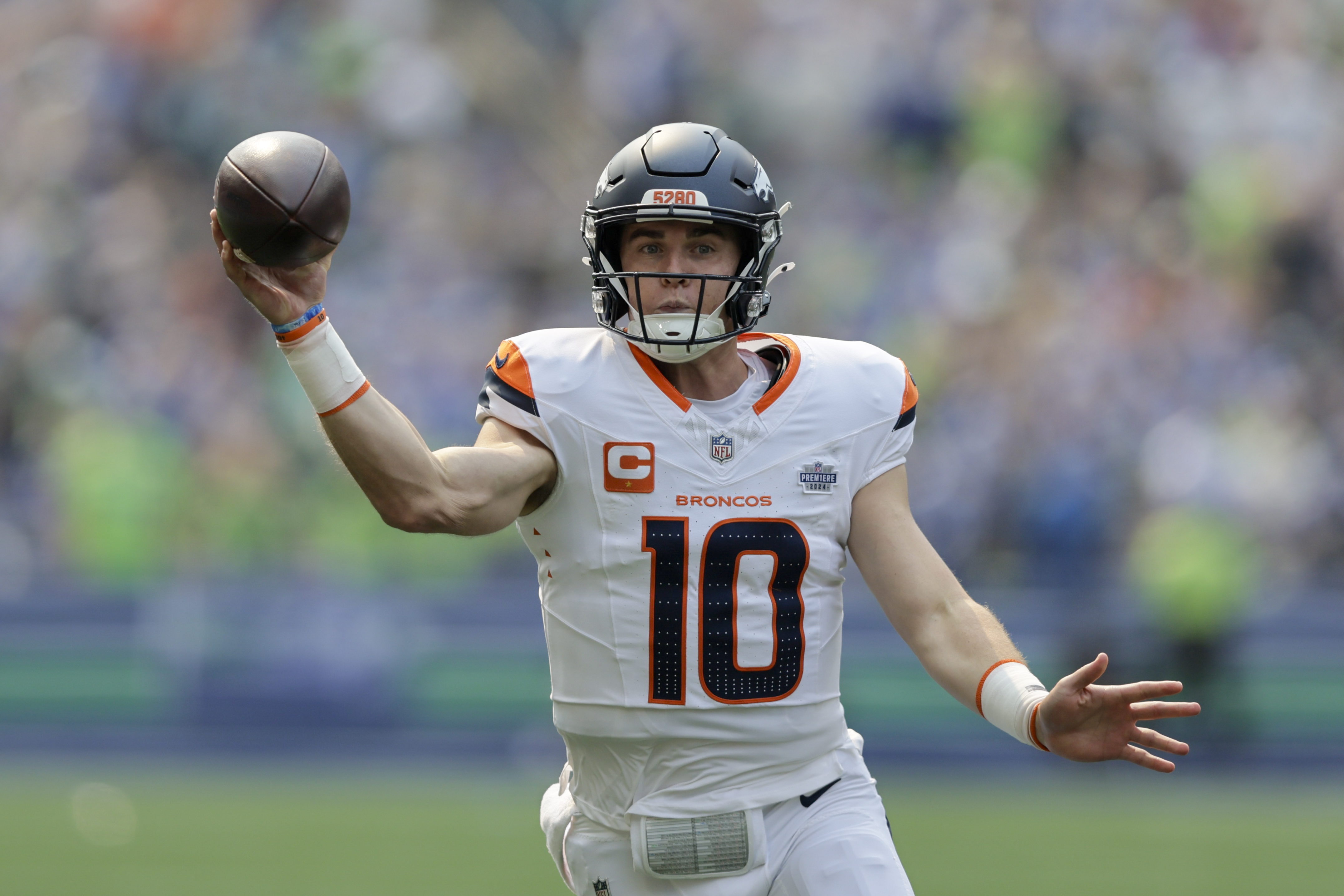 Denver Broncos quarterback Bo Nix (10) throws during the first half of an NFL football game against the Seattle Seahawks, Sunday, Sept. 8, 2024, in Seattle. (AP Photo/John Froschauer) (John Froschauer)