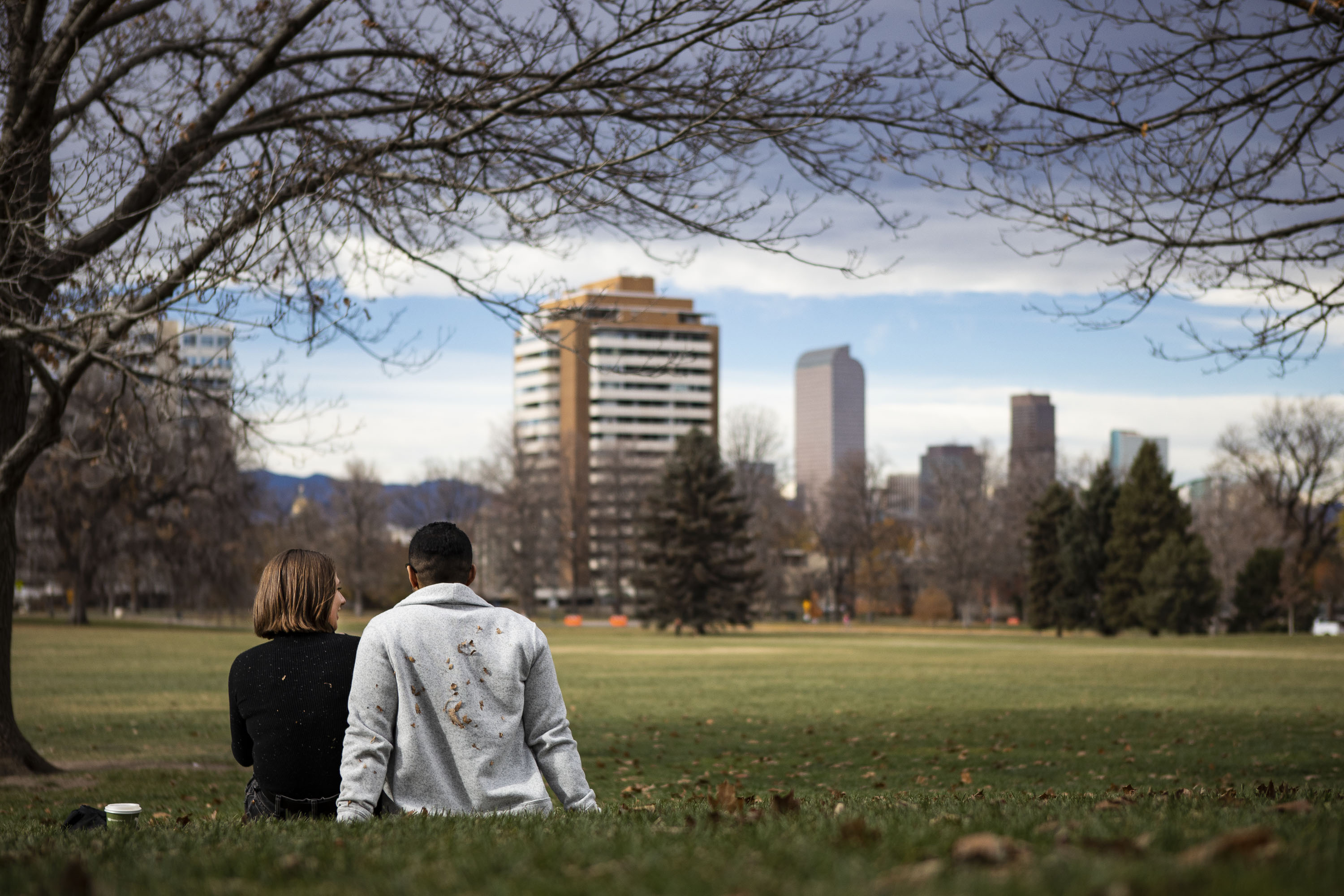 FILE PHOTO: Fran Lubecki-Wilde, left, and Isaiah Jackson enjoy the warm weather while hanging out in Cheesman Park in Denver, Colo. (Timothy Hurst/The Gazette) (Timothy Hurst/Denver Gazette)