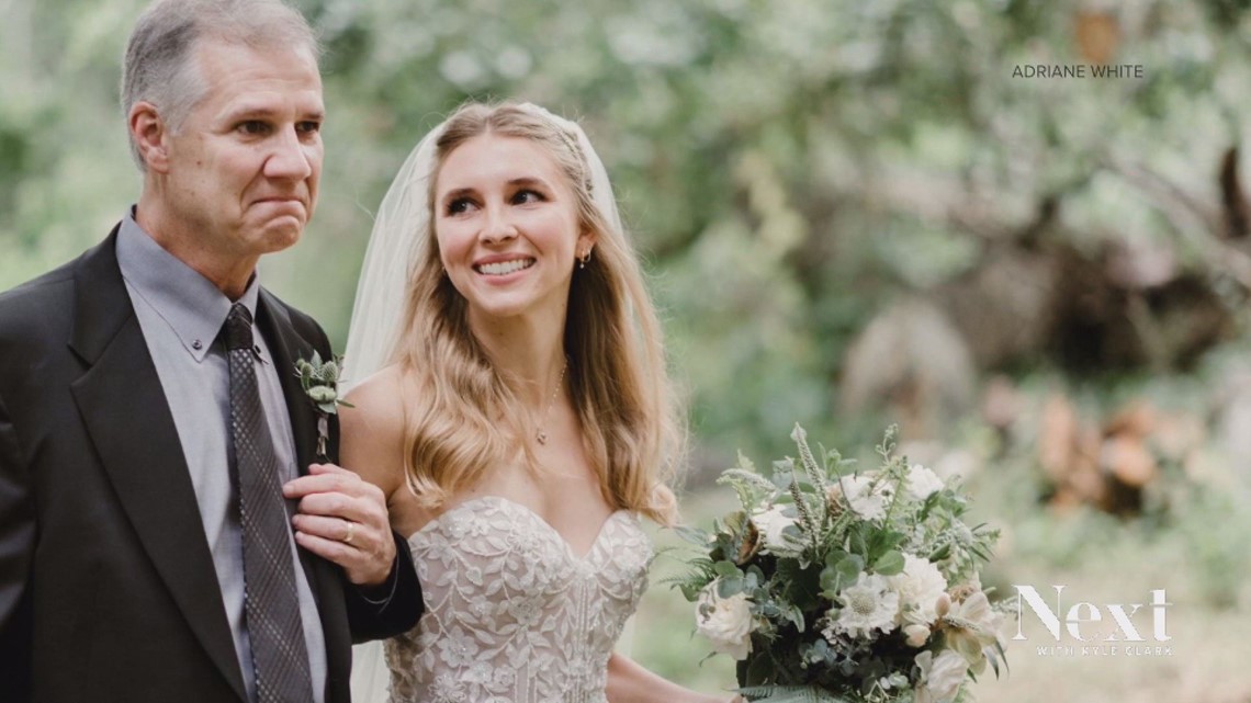 Kevin Mahoney, one of the victims in the 2021 King Soopers mass shooting, walks his daughter down the aisle. (Adriane White (via 9News))