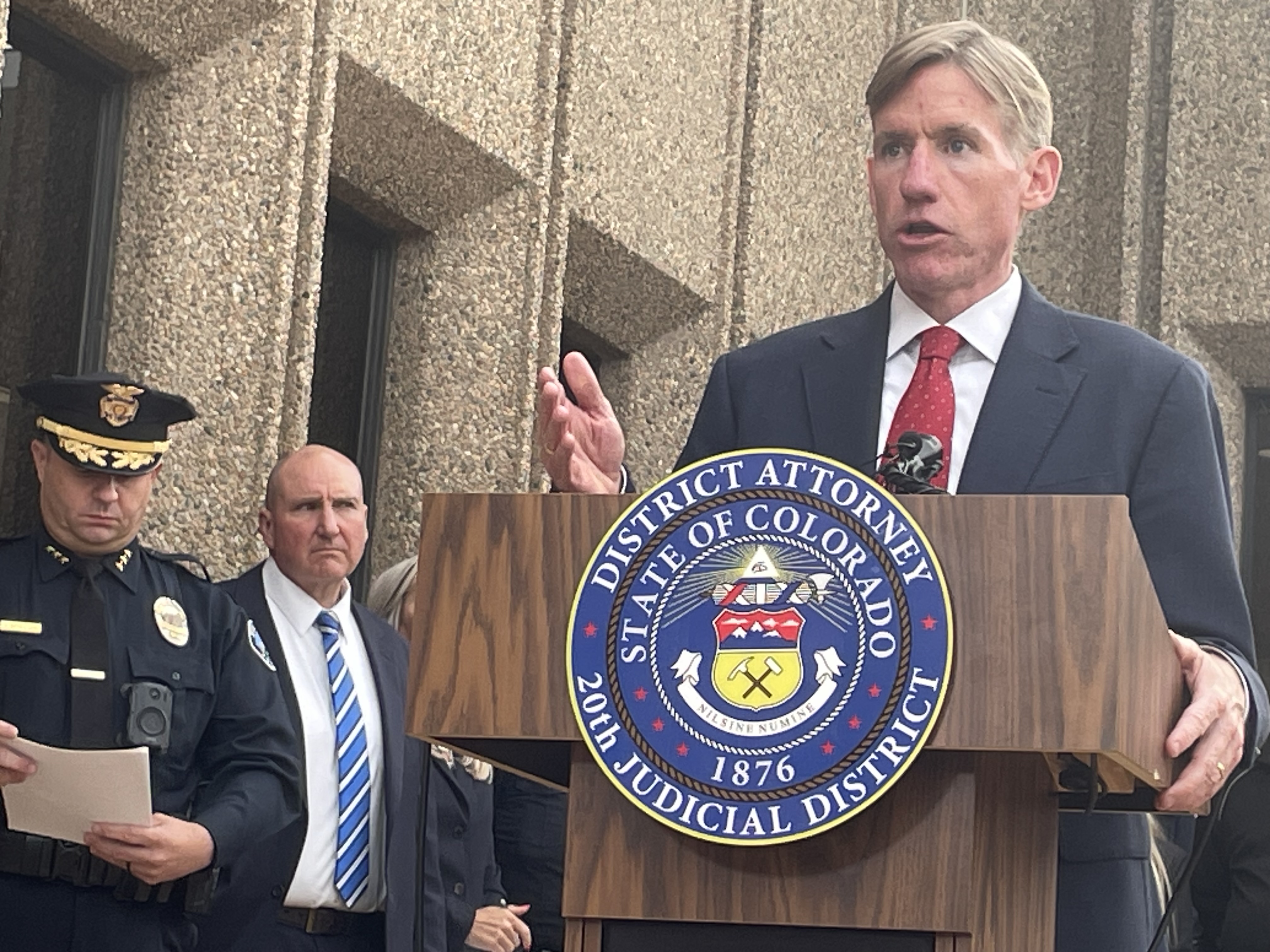 District Attorney Michael Dougherty holds a press conference with families of the victims after Ahmad Alissa, the gunman of the 2021 mass shooting in Boulder, was found guilty of murder on Sept. 23, 2024. (CarolMcKinleyDenver Enterprise Reportercarol.mckinley@gazette.comhttps://denvergazette.com/content/tncms/avatars/5/c3/a0f/5c3a0fbe-1007-11ec-9e18-b7f42cfa4b0f.9565a0ce58866e86bcf18260621c2a46.png)