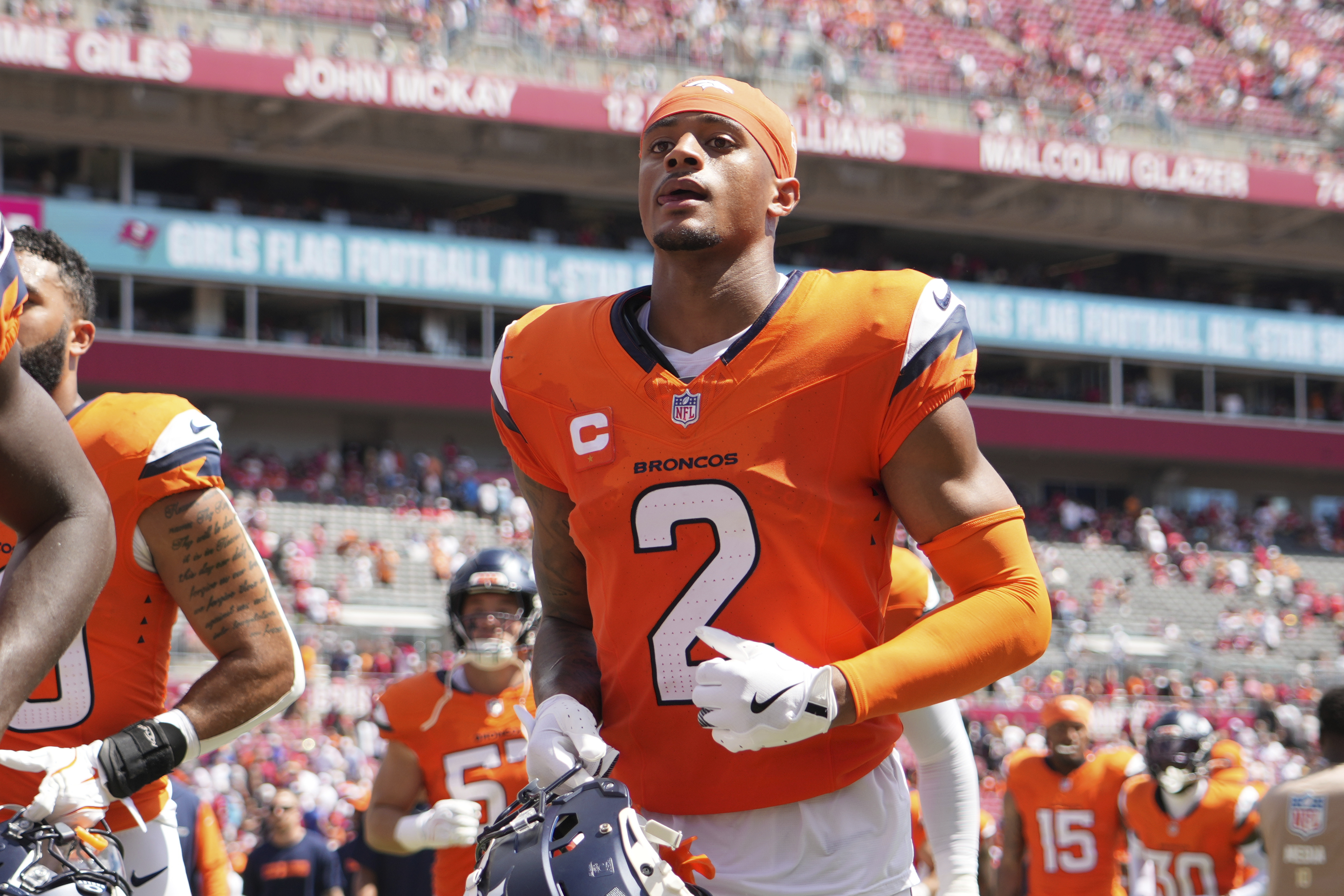 Denver Broncos cornerback Pat Surtain II (2) jogs to the locket room at half time during an NFL football game against the Tampa Bay Buccaneers, Sunday, Sept. 22, 2024, in Tampa, Fla. (AP Photo/Peter Joneleit) (Peter Joneleit)