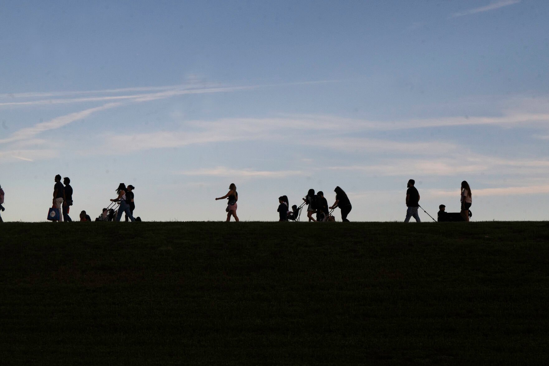 Crowds head to the balloon glow of the Colorado Springs Labor Day Lift Off on Sunday, Sept. 1, 2024.