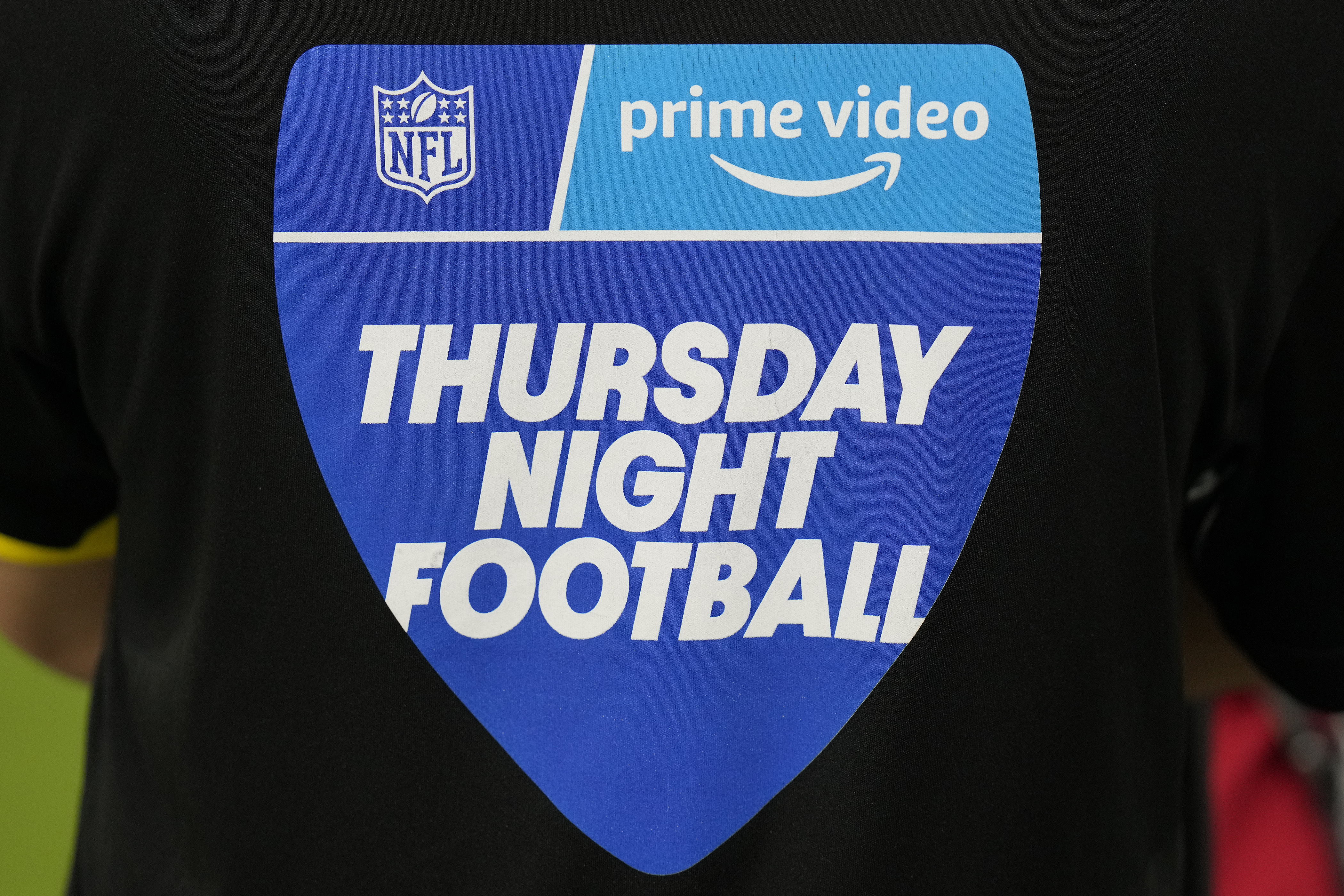 A Thursday Night Football crew member is shown during the first half of an NFL football game between the Baltimore Ravens and Tampa Bay Buccaneers Thursday, Oct. 27, 2022, in Tampa, Fla. (AP Photo/Chris O'Meara) (Chris O'Meara)