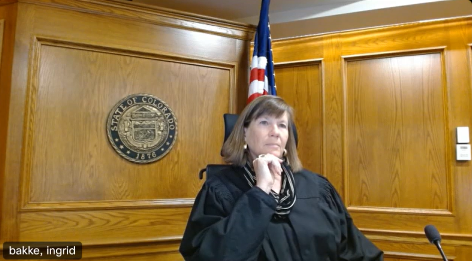 Twentieth Judicial District Chief Judge Ingrid Bakke listens to opening statements by District Attorney Michael Dougherty Thursday morning at the beginning of Ahmad Alissa's criminal trial. (Courtesy of the 20th Judicial District)