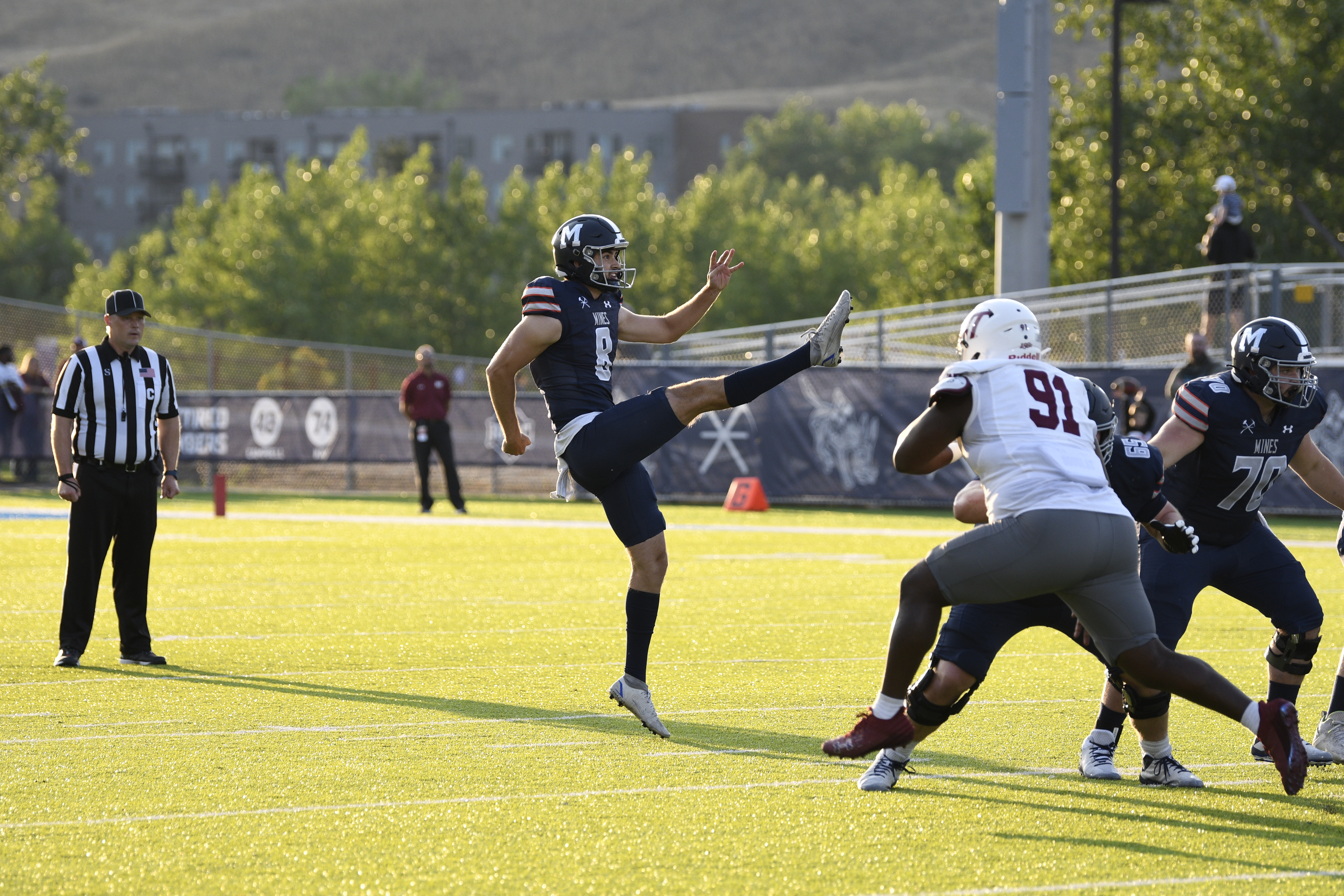 Colorado School of Mines junior punter Blake Doud follows through on a kick during a game against West Texas A&M on Thursday, Sept. 5, 2024 at Marv Kay Stadium in Golden. (Courtesy of Mines Athletics)