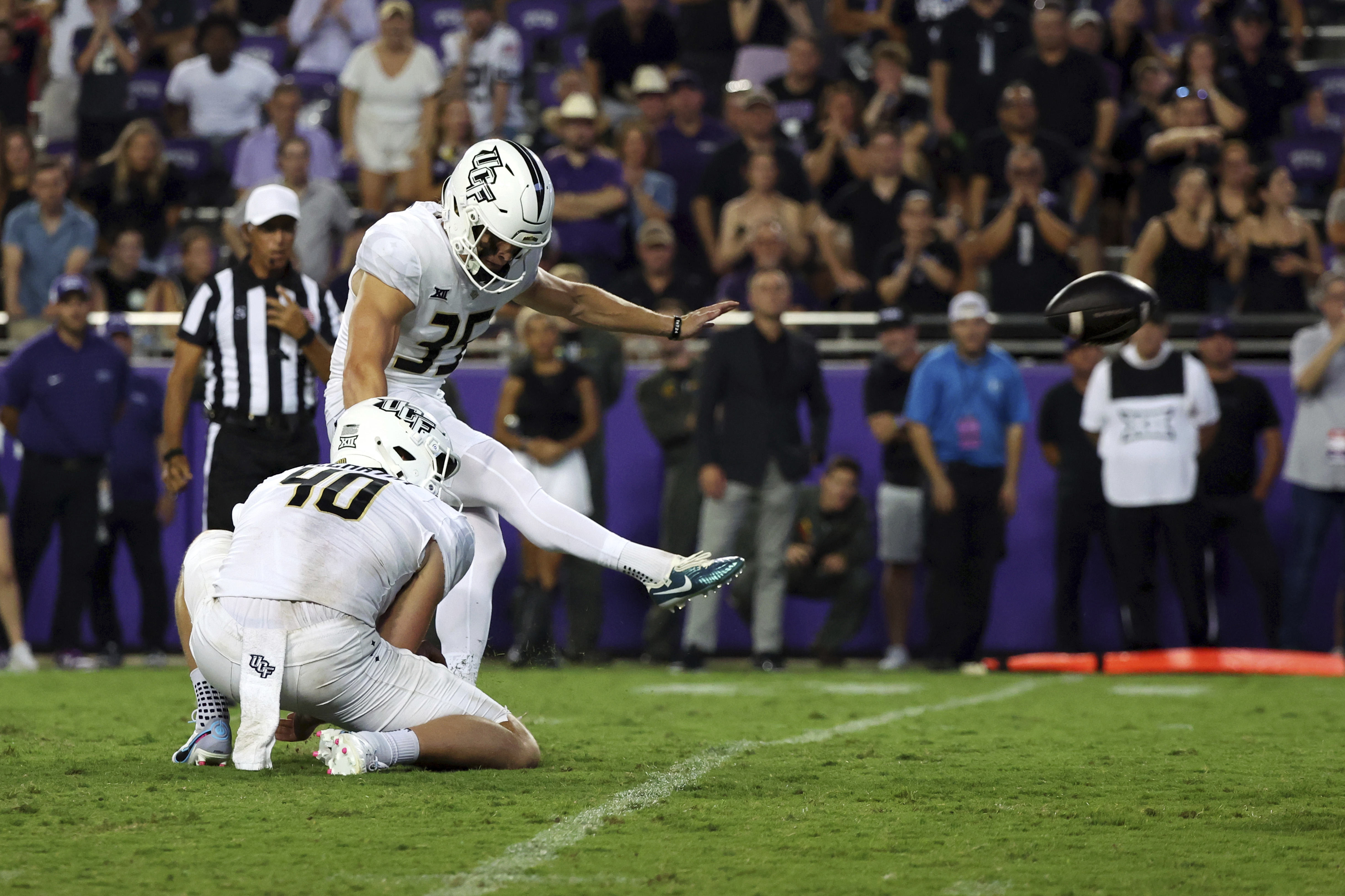 Central Florida place kicker Colton Boomer (35) kicks the game winning extra point against TCU in the fourth quarter during an NCAA college football game Saturday, Sept. 14, 2024, in Fort Worth, Texas. (AP Photo/Richard W. Rodriguez) (Richard W. Rodriguez)