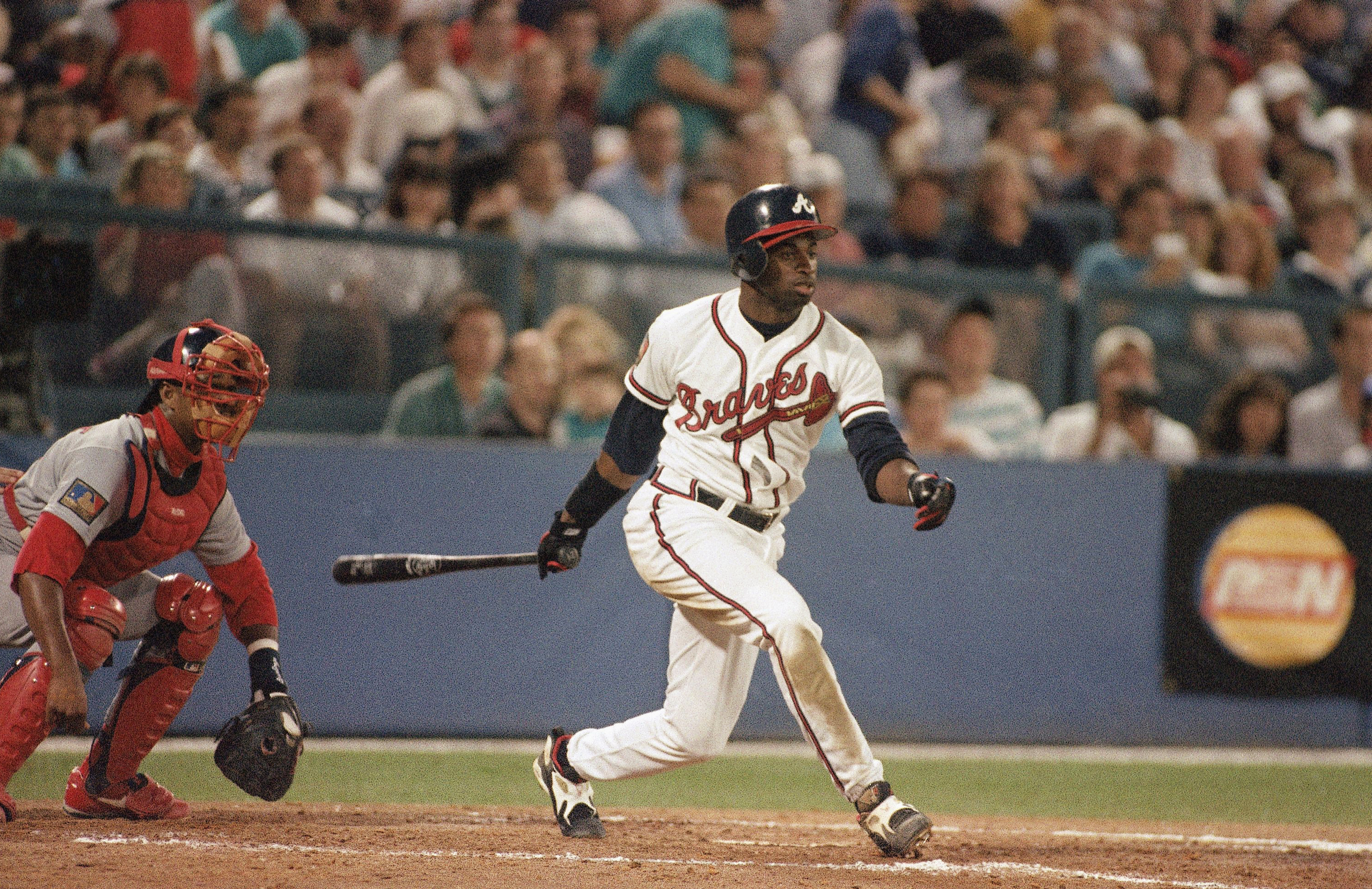 Atlanta Braves Deion Sanders hits a two-run single during the Braves 8-3 loss to the St. Louis Cardinals on Wednesday, April 20, 1994 in Atlanta. Sanders, who also in an All-Pro corner back with the Atlanta Falcons, has 24 hits, scored 15 runs, drawn eight walks, hit three home runs and driven in 15 runs as the team?s lead-off hitter. (AP Photo/John Bazemore) (John Bazemore)