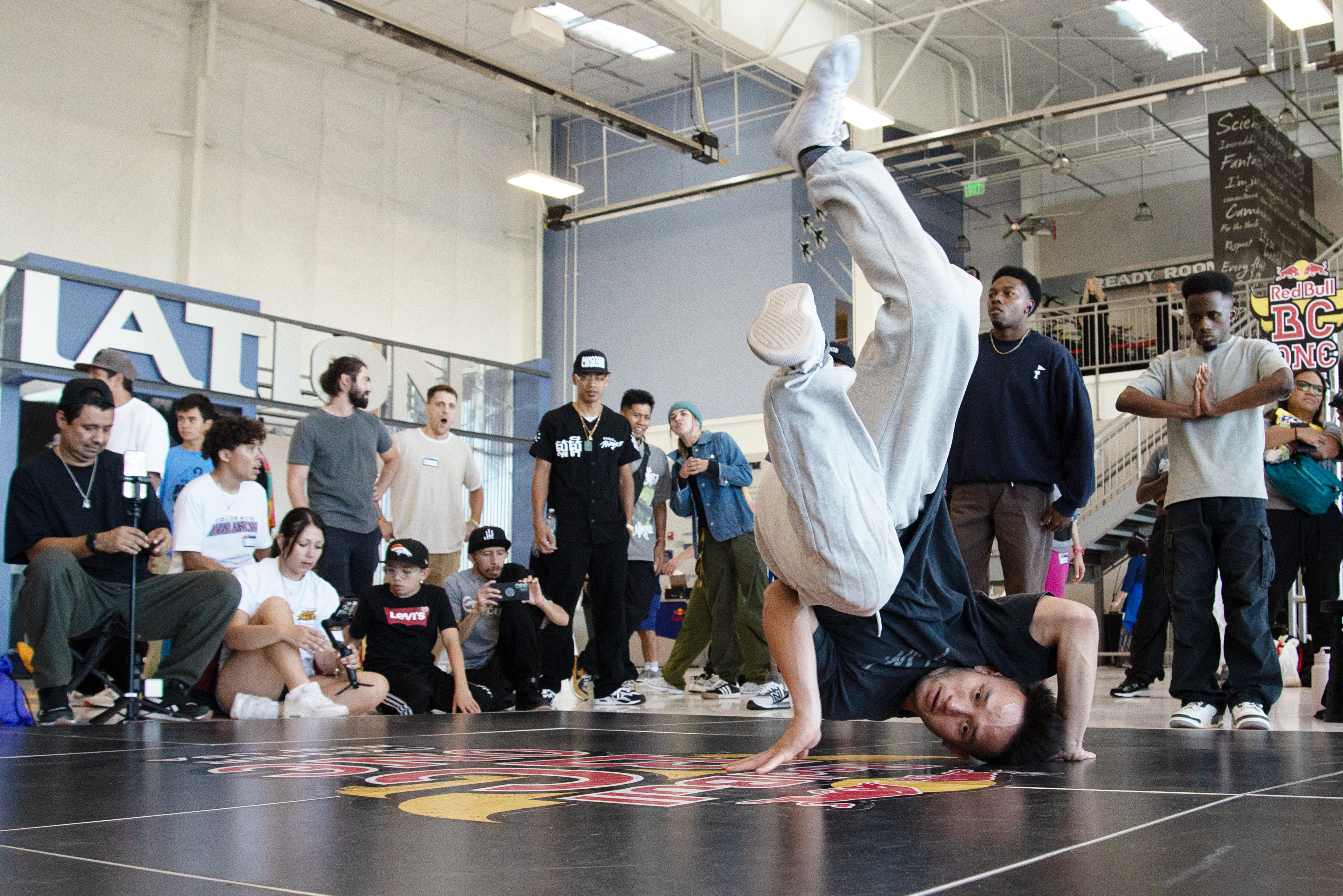 Spectators watch breakdancers perform in the Red Bull BC One West Cypher preliminary event Friday, Sept. 20, 2024 at the Wings Over the Rockies Exploration of Flight museum Centennial, Colo. (TomHellauerMultimedia Producertom.hellauer@denvergazette.comhttps://denvergazette.com/content/tncms/avatars/f/9e/622/f9e6228a-3b6b-11ed-bf10-fbb71fa8e421.f54b911252c540f1d61709edc4727a39.png)