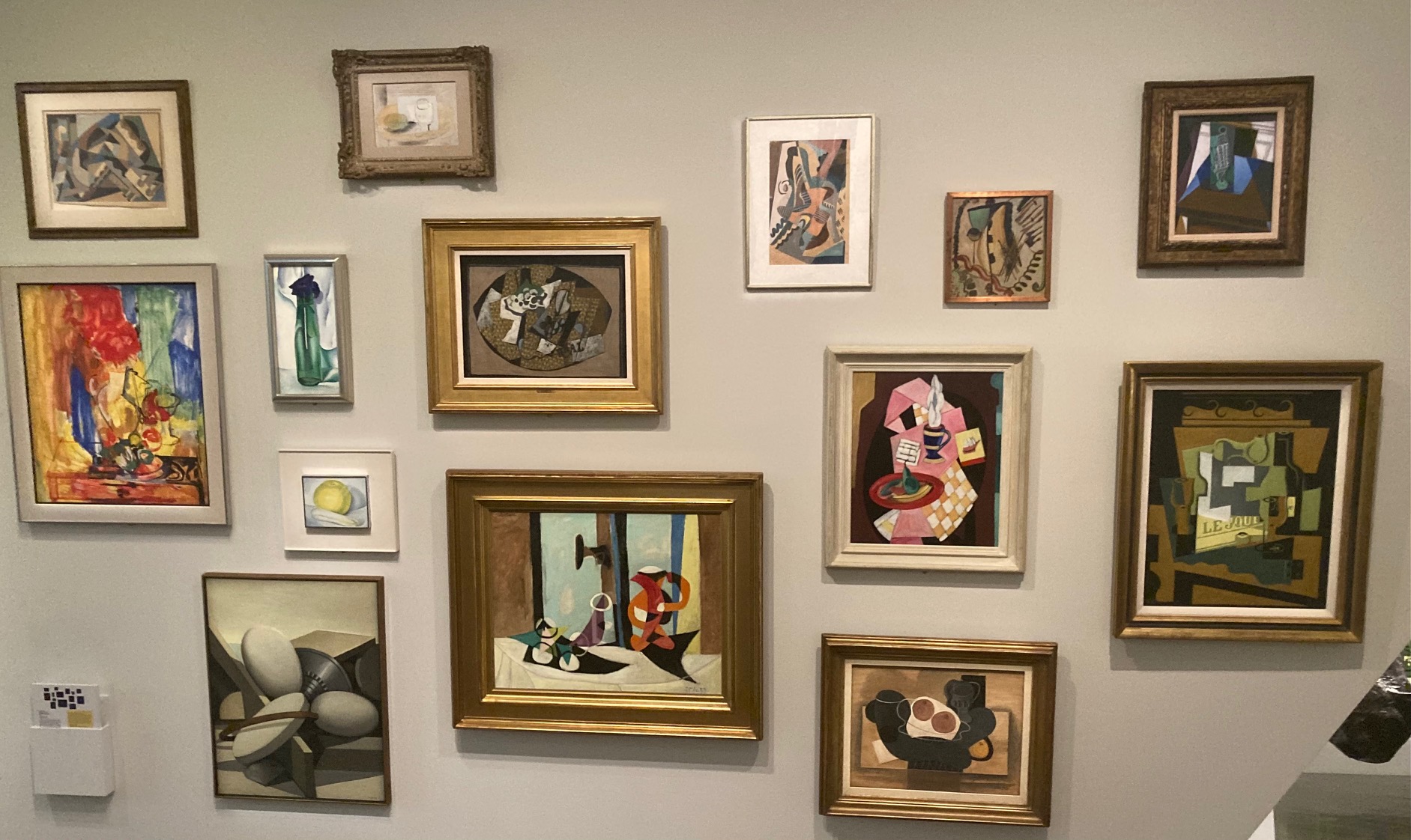 On one of the angled walls in the Hamilton Building, Curator Rory Padeken installed numerous still-life works by blue-chip artists such as Pablo Picasso, Georgia O’Keeffe and Joan Miro’. (Colleen Smith/Special to The Denver Gazette)