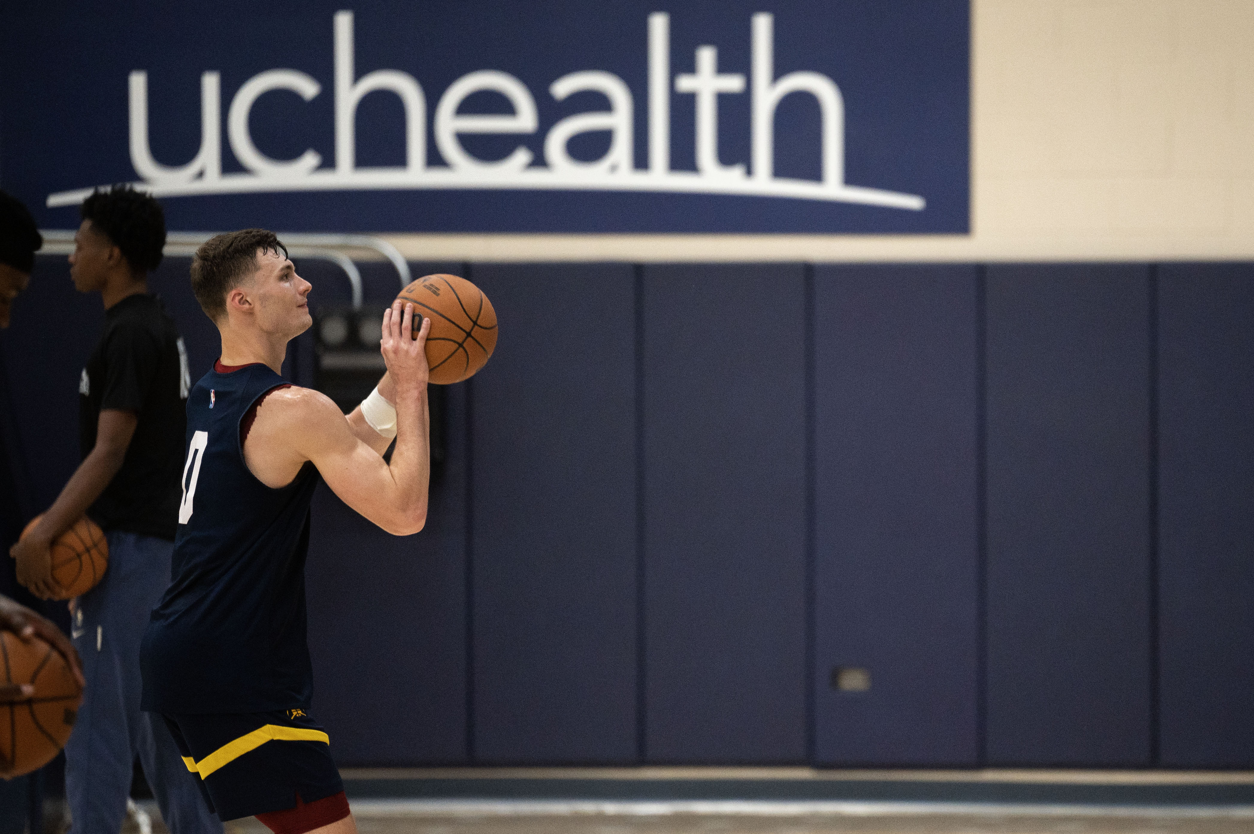 Nuggets guard Christian Braun practices three-pointers during Nuggets training camp in Denver on Friday, Sept. 27, 2024 (Stephen Swofford, Denver Gazette) (StephenSwoffordPhotographerstephen.swofford@gazette.comhttps://secure.gravatar.com/avatar/1ddcaf11c5d70eaa58546ddc4e038687?d=mm&r=g)