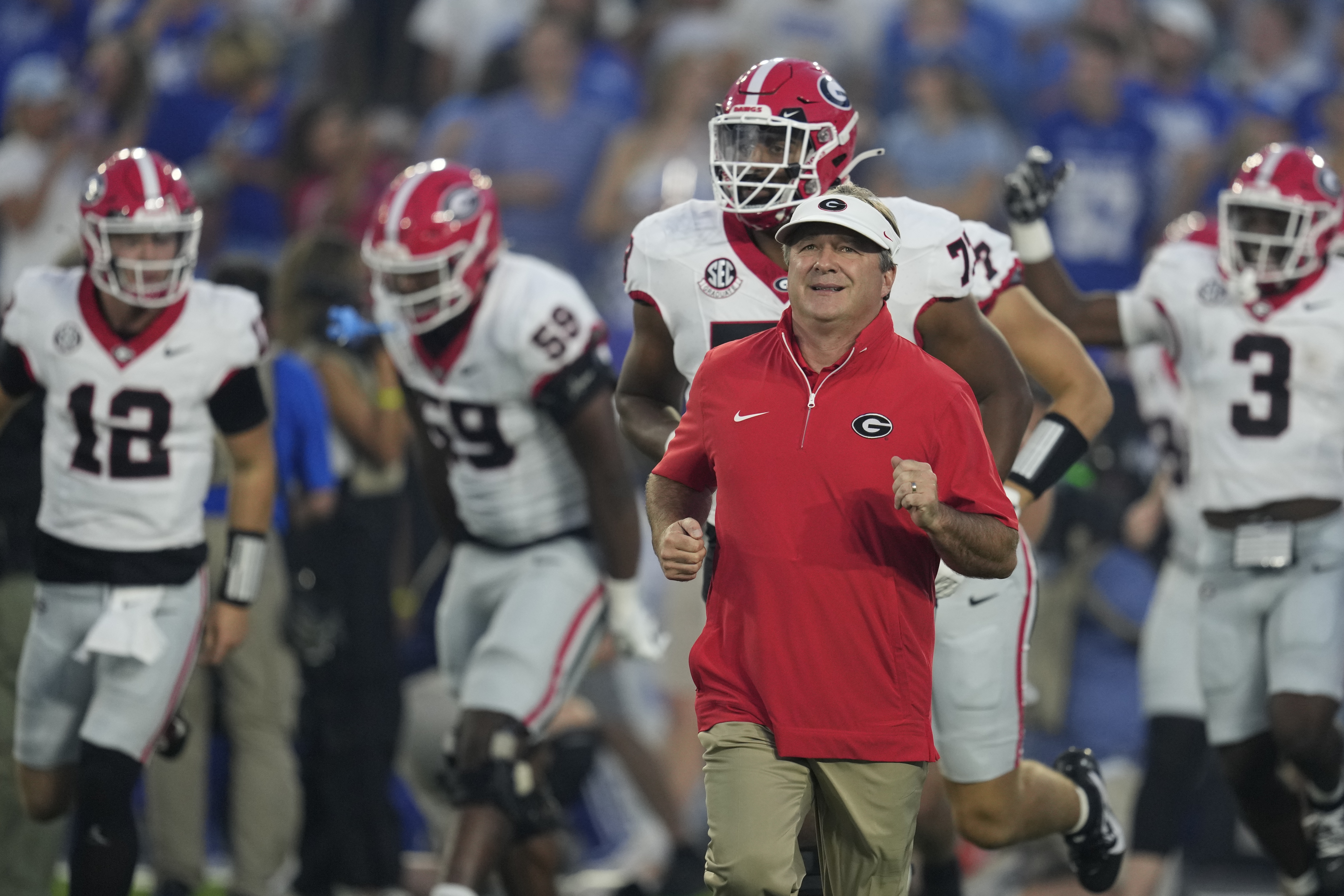 Georgia head coach Kirby Smart runs onto the field before an NCAA college football game against Kentucky, Saturday, Sept. 14, 2024, in Lexington, Ky. (AP Photo/Darron Cummings) (Darron Cummings)