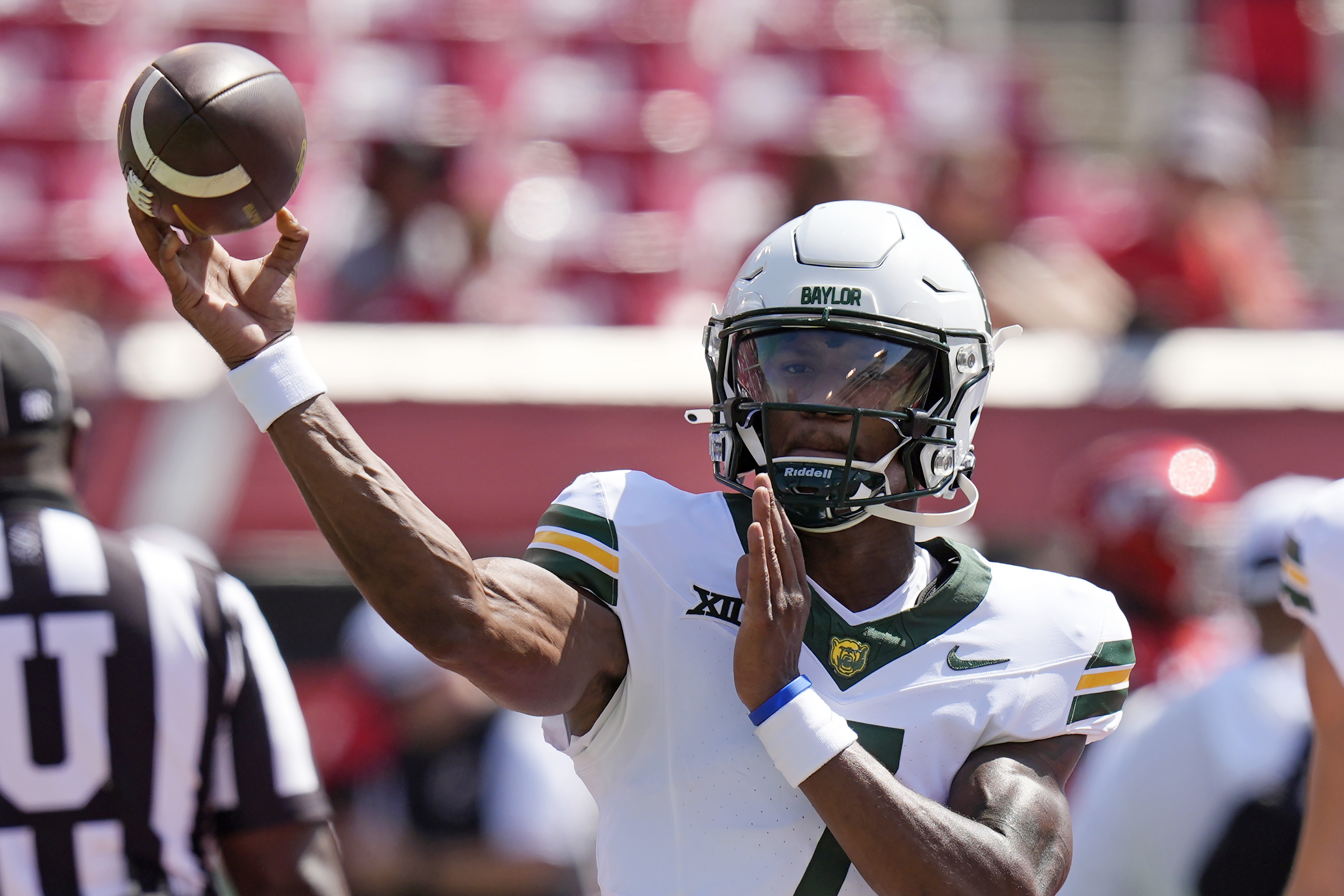 Baylor quarterback Dequan Finn (7) warms up before an NCAA college football game against Utah, Saturday, Sept. 7, 2024, in Salt Lake City. (AP Photo/Rick Bowmer) (Rick Bowmer)