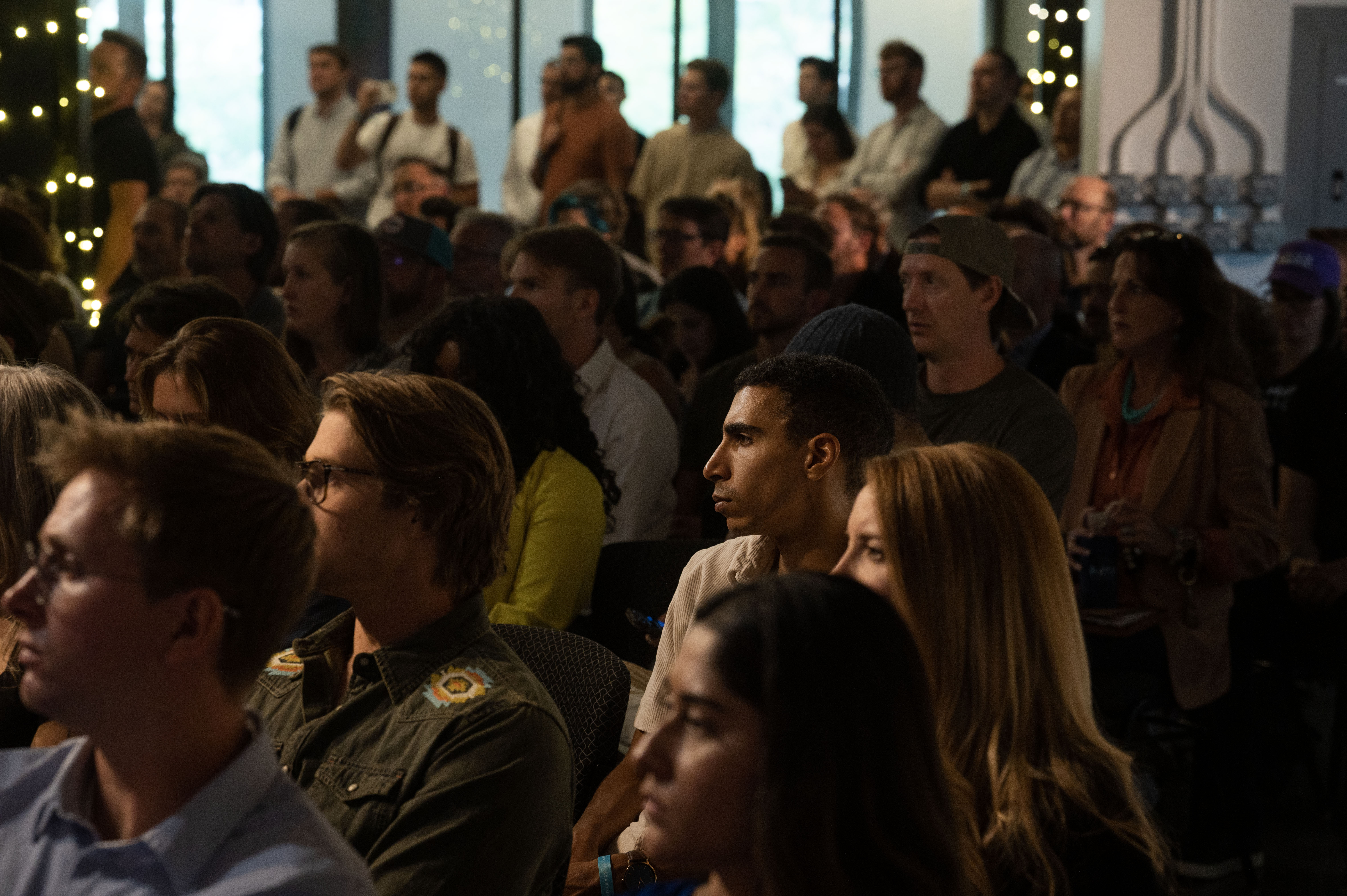 A crowded room listens as Governor Jared Polis gives a keynote address at the start of Denver Startup Week at the McNichols Building in Denver on Tuesday, Sept. 17, 2024. (Stephen Swofford, Denver Gazette) (Stephen Swofford Denver Gazette)