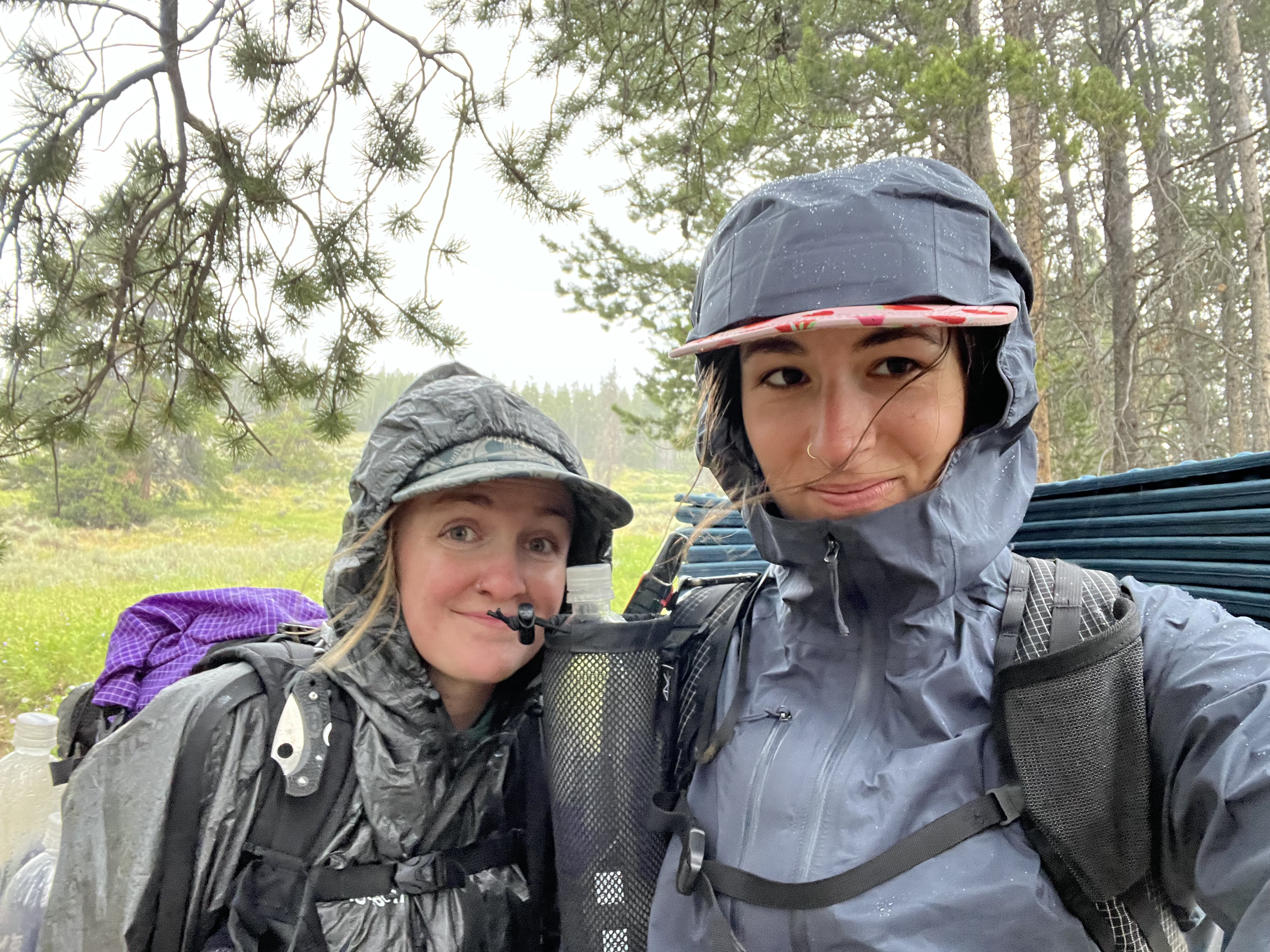 Kyla Pearce and Ariella Nardizzi pose for a selfie in the rain after outrunning a thunderstorm near Breckenridge on the Colorado Trail on Aug. 9. (Ariella Nardizzi, Special to The Gazette)