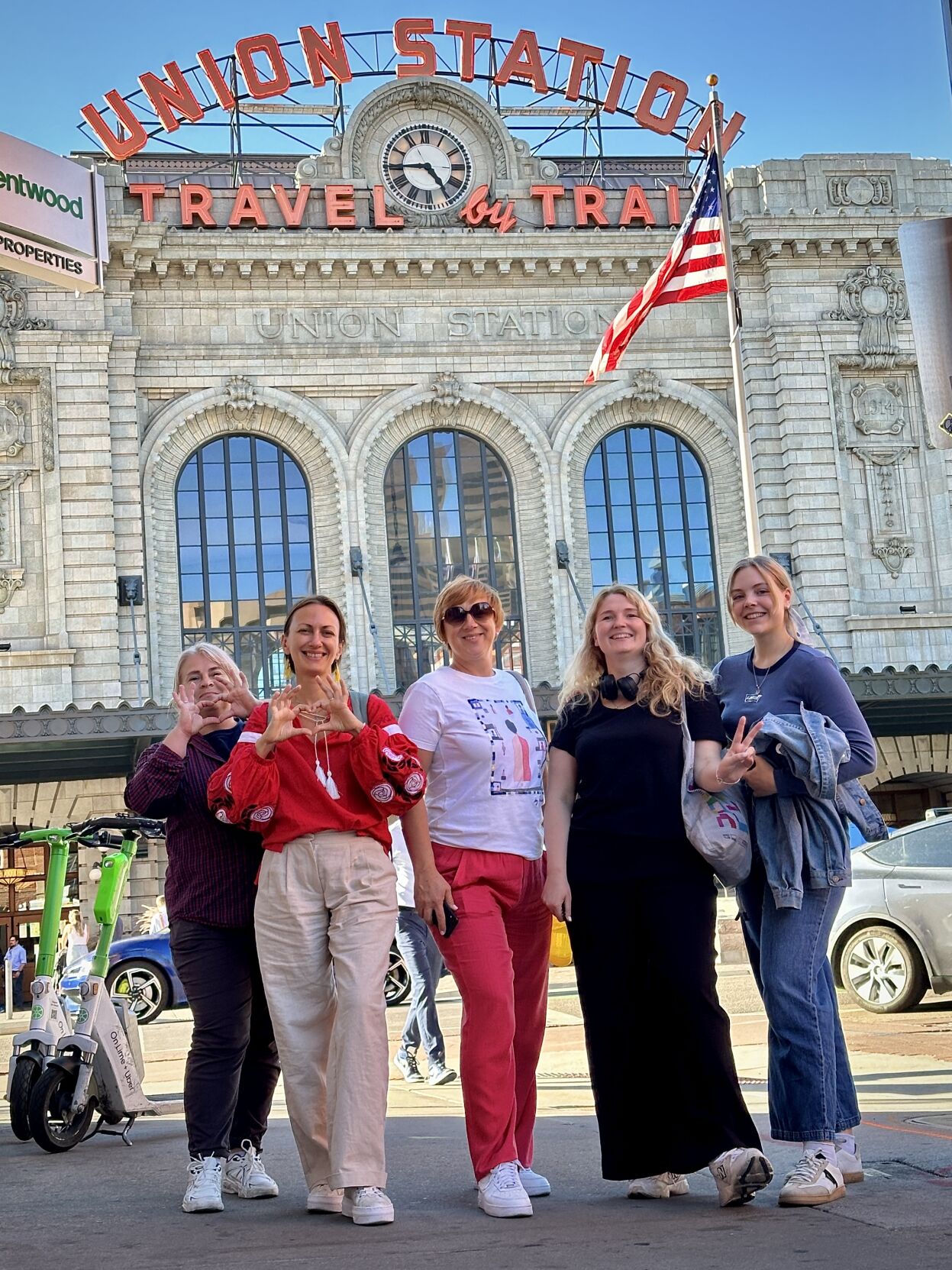 Ukrainian journalists and the program director and senior program manager of the Ukraine Media Partnership Program pose at Denver’s Union Station during their whirlwind tour of Colorado. (Evan Wyloge for the gazette)