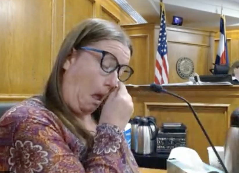Jennifer Jacobsen is emotional as she tells the jury about the three deaths she saw in the King Soopers parking lot on Thursday, Sept. 12, 2024. She and the second victim, Kevin Mahoney, had a friendly exchange before he was shot. (Screengrab of 20th Judicial District WebEx live feed)