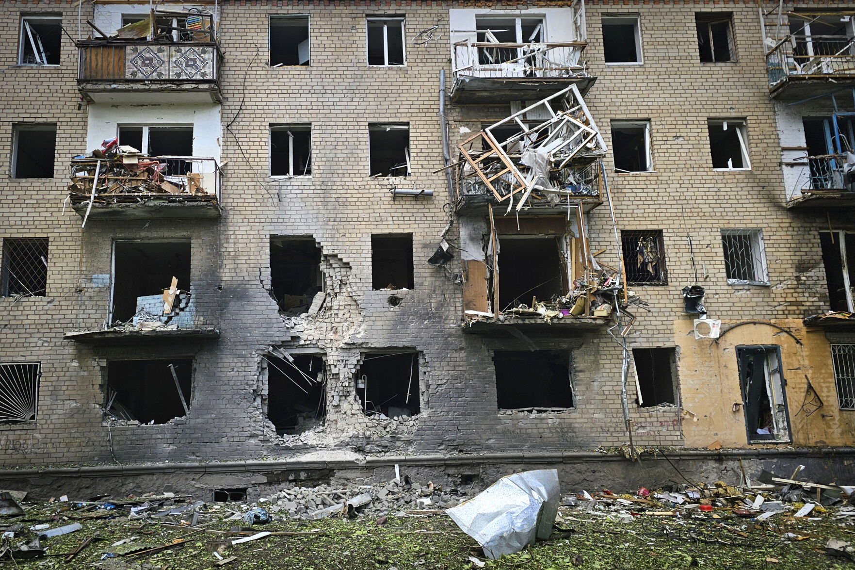 An apartment building is seen at the site of a Russian army attack with guided aerial bombs in Kherson, Ukraine, in May. (Kherson Regional Military Administration via AP)